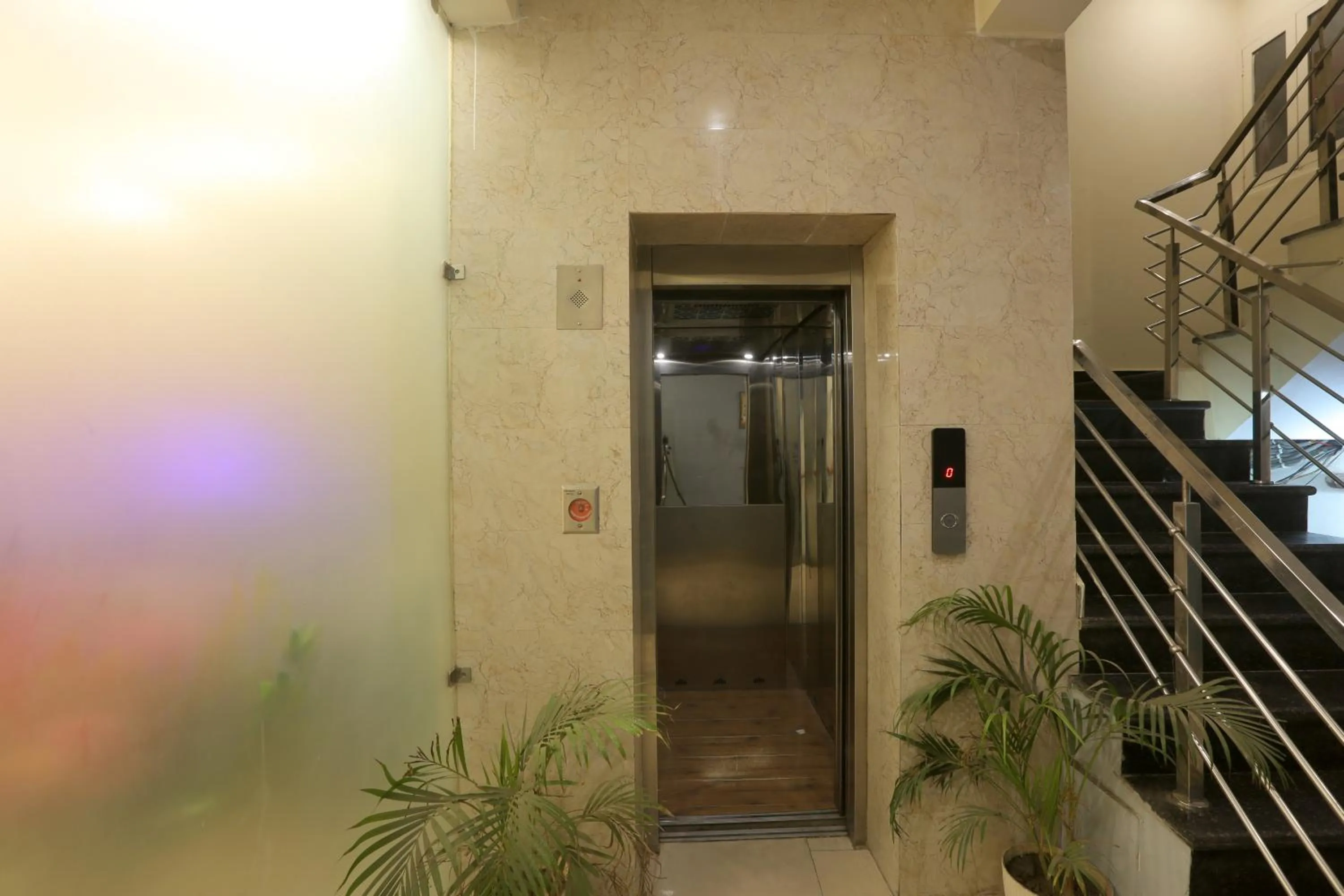 elevator in Hotel Lemon Suites & Banquet By Aura