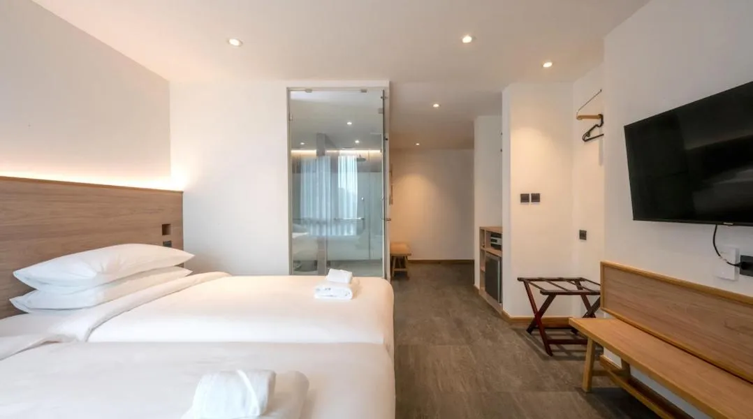 Bed in ZEN MASTER HOTEL