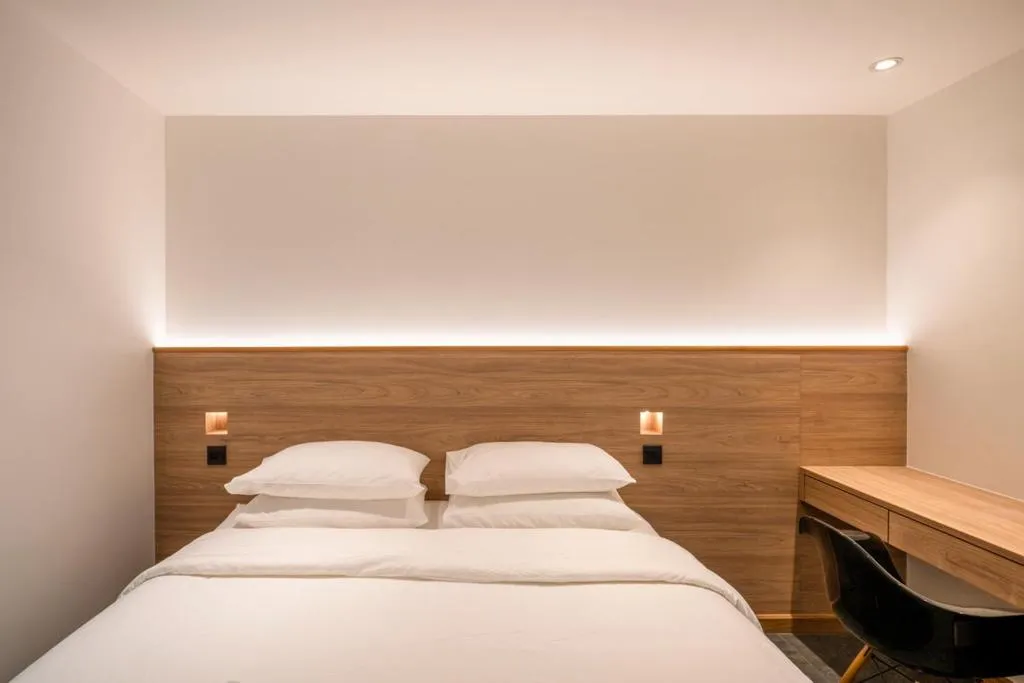 Bed in ZEN MASTER HOTEL