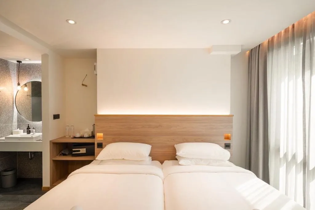 Bed in ZEN MASTER HOTEL