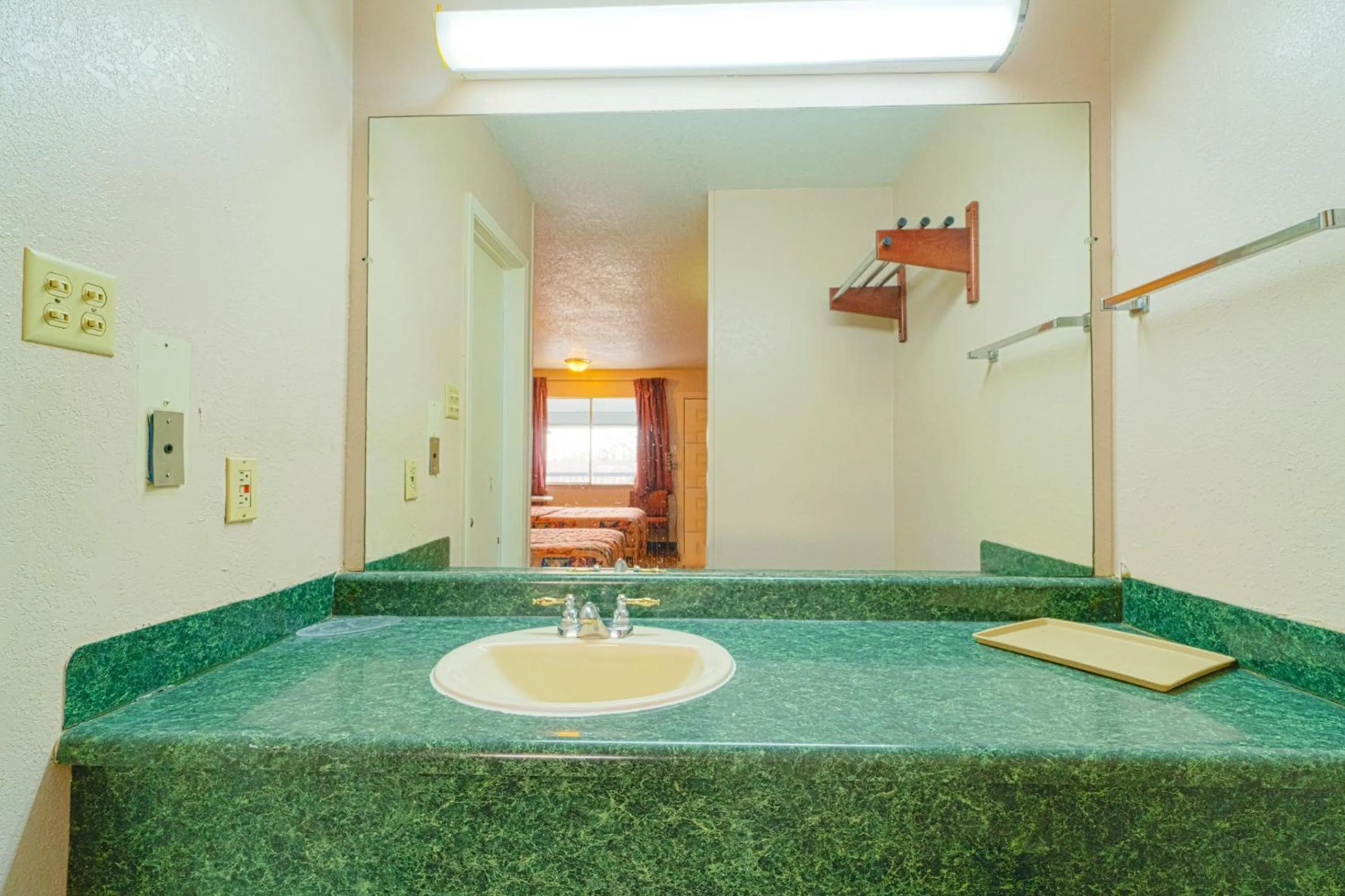 Bathroom in Regency Inn Three Rivers I-37