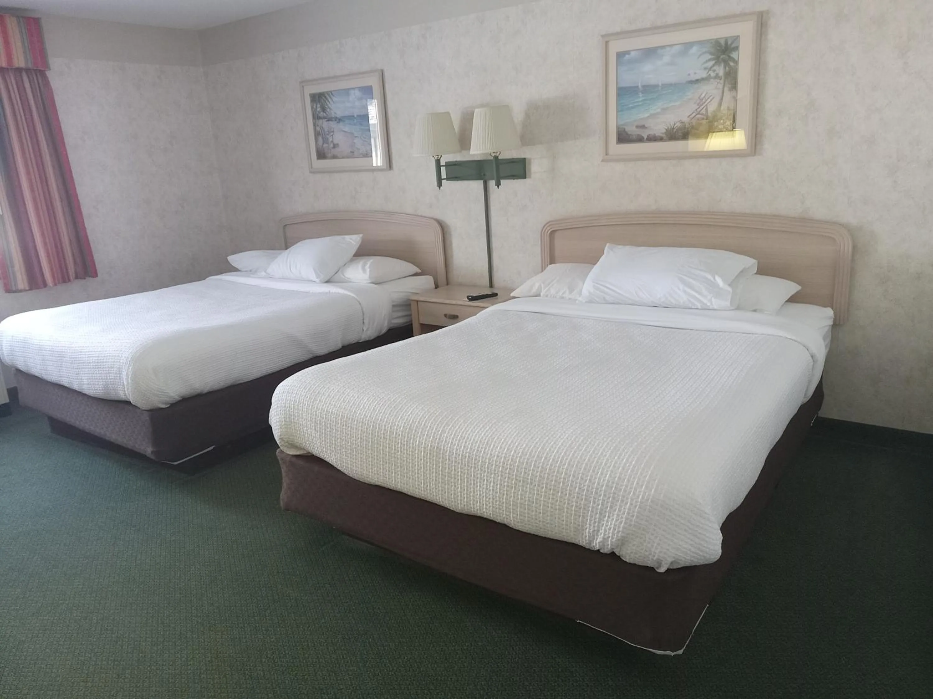 Bed in Paradise Shores Hotel