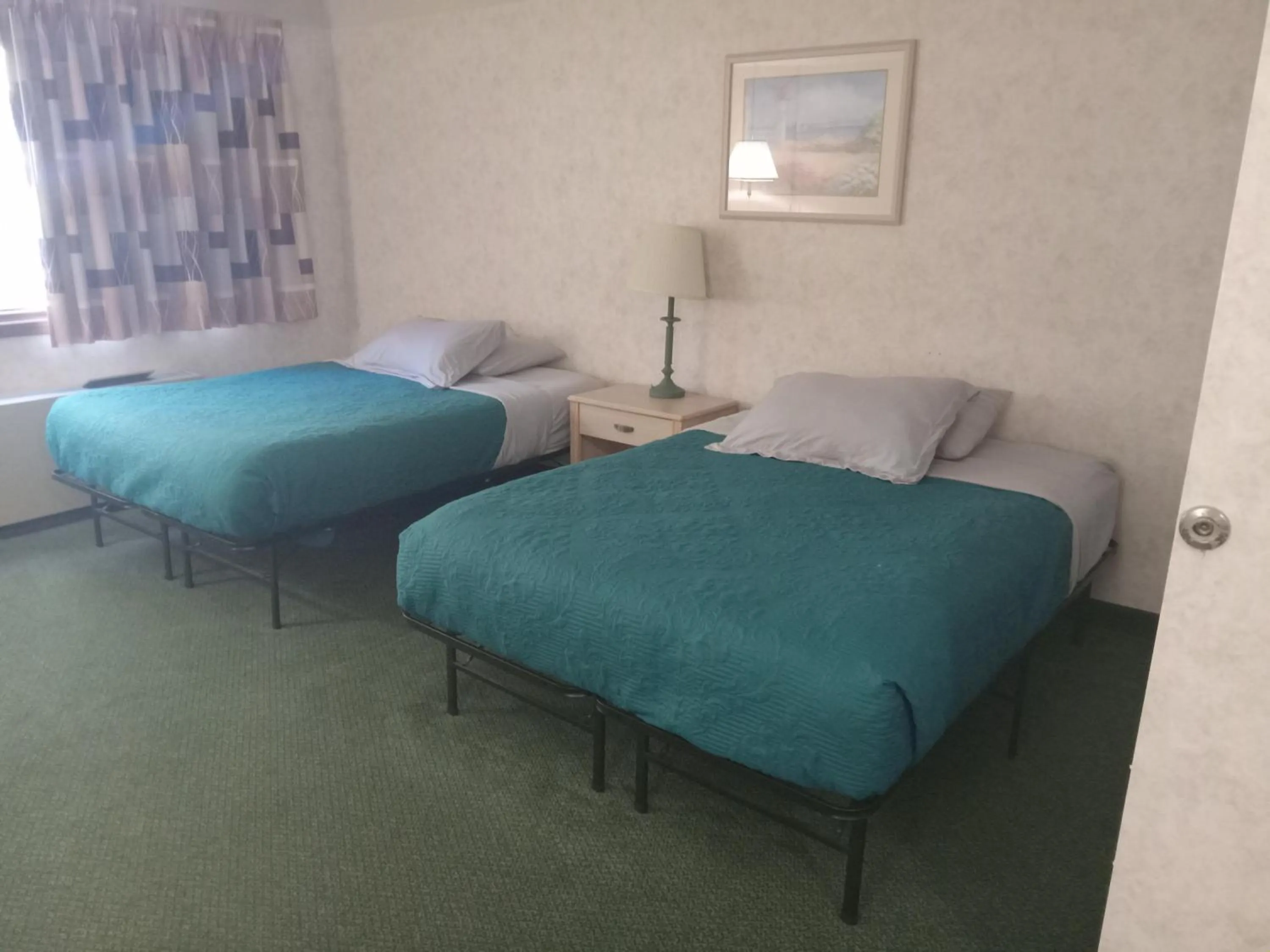 Bed in Paradise Shores Hotel