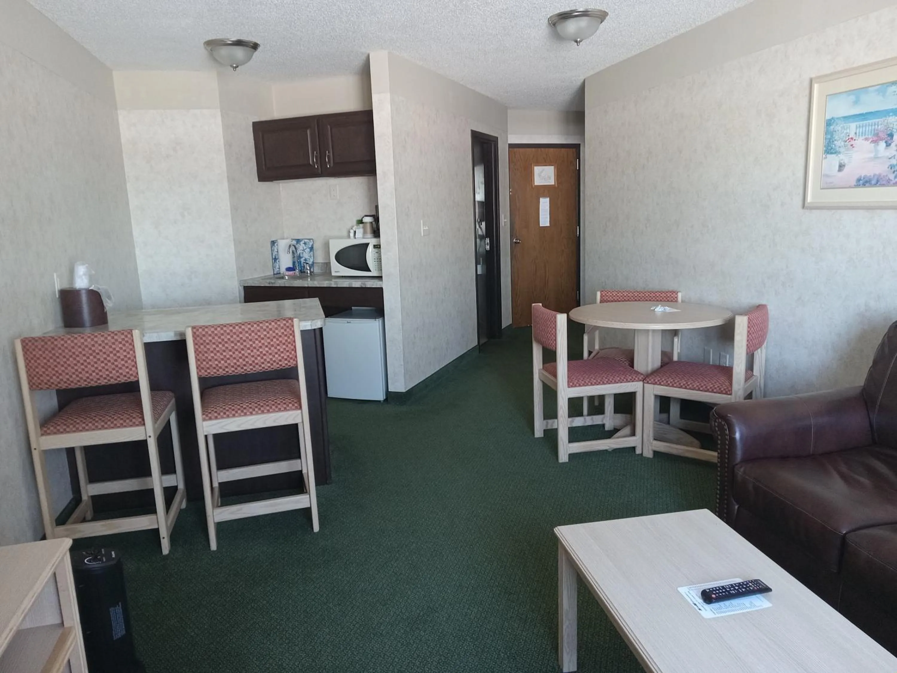 Kitchen or kitchenette in Paradise Shores Hotel