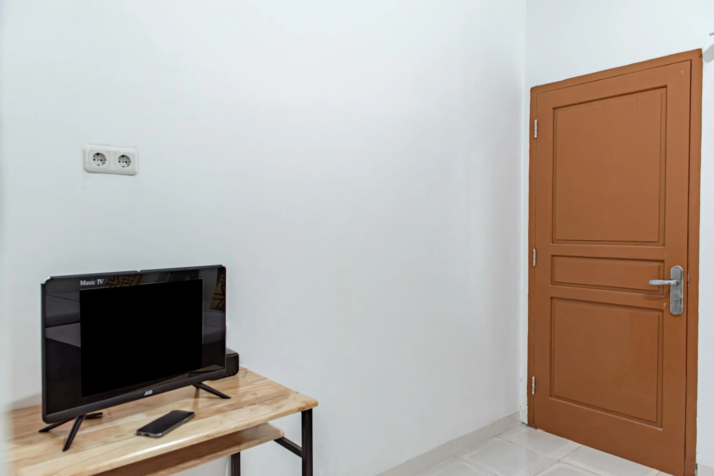 Bedroom in Hotel O Alnasya Syariah