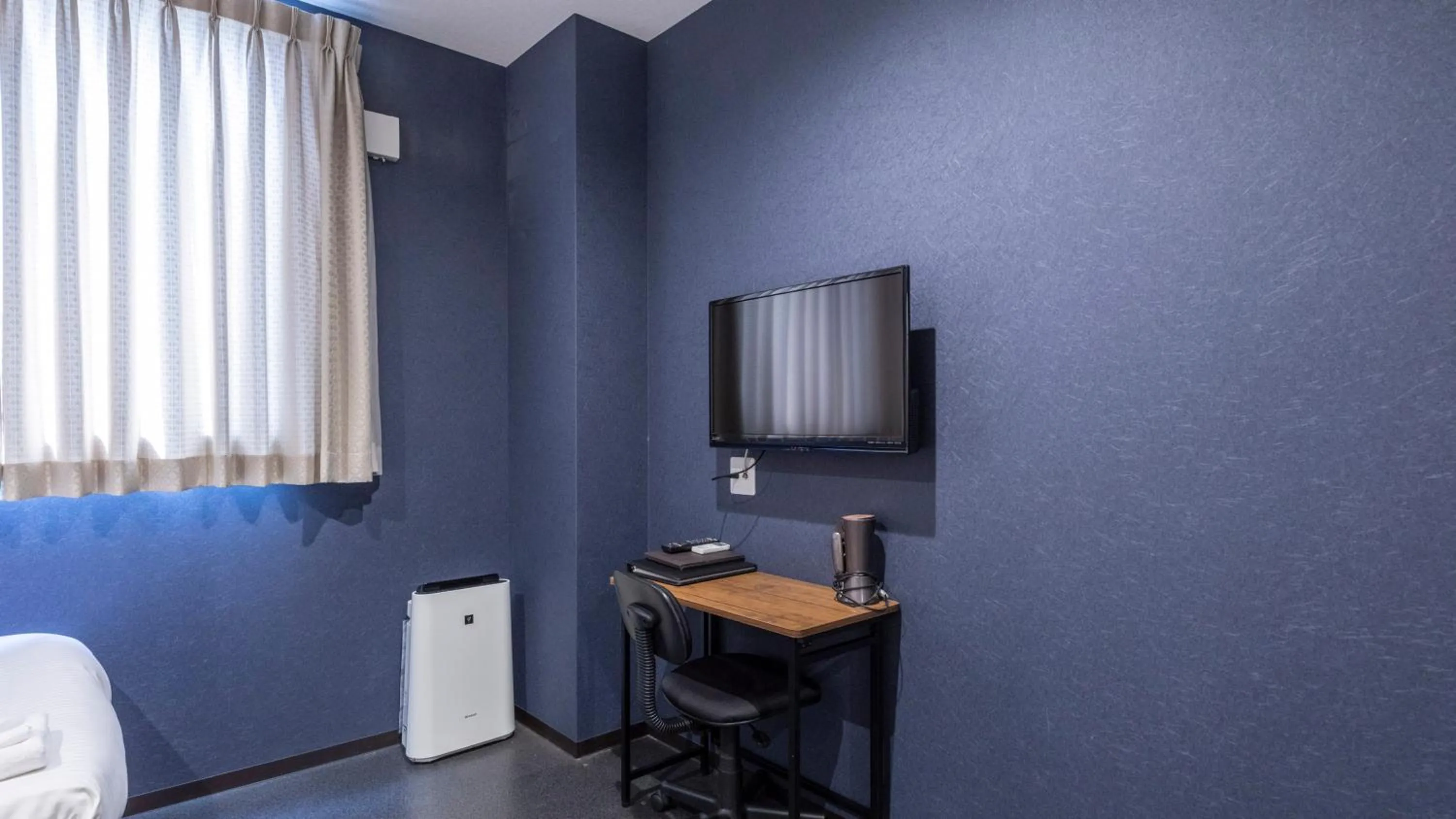 Photo of the whole room in Tabist OSAKA PORT HOTEL L'ESPOIR