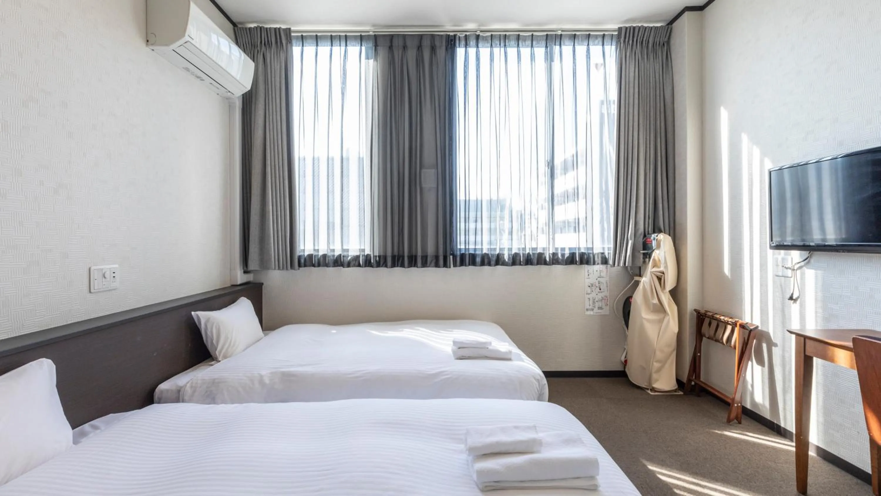Photo of the whole room, Bed in Tabist OSAKA PORT HOTEL L'ESPOIR