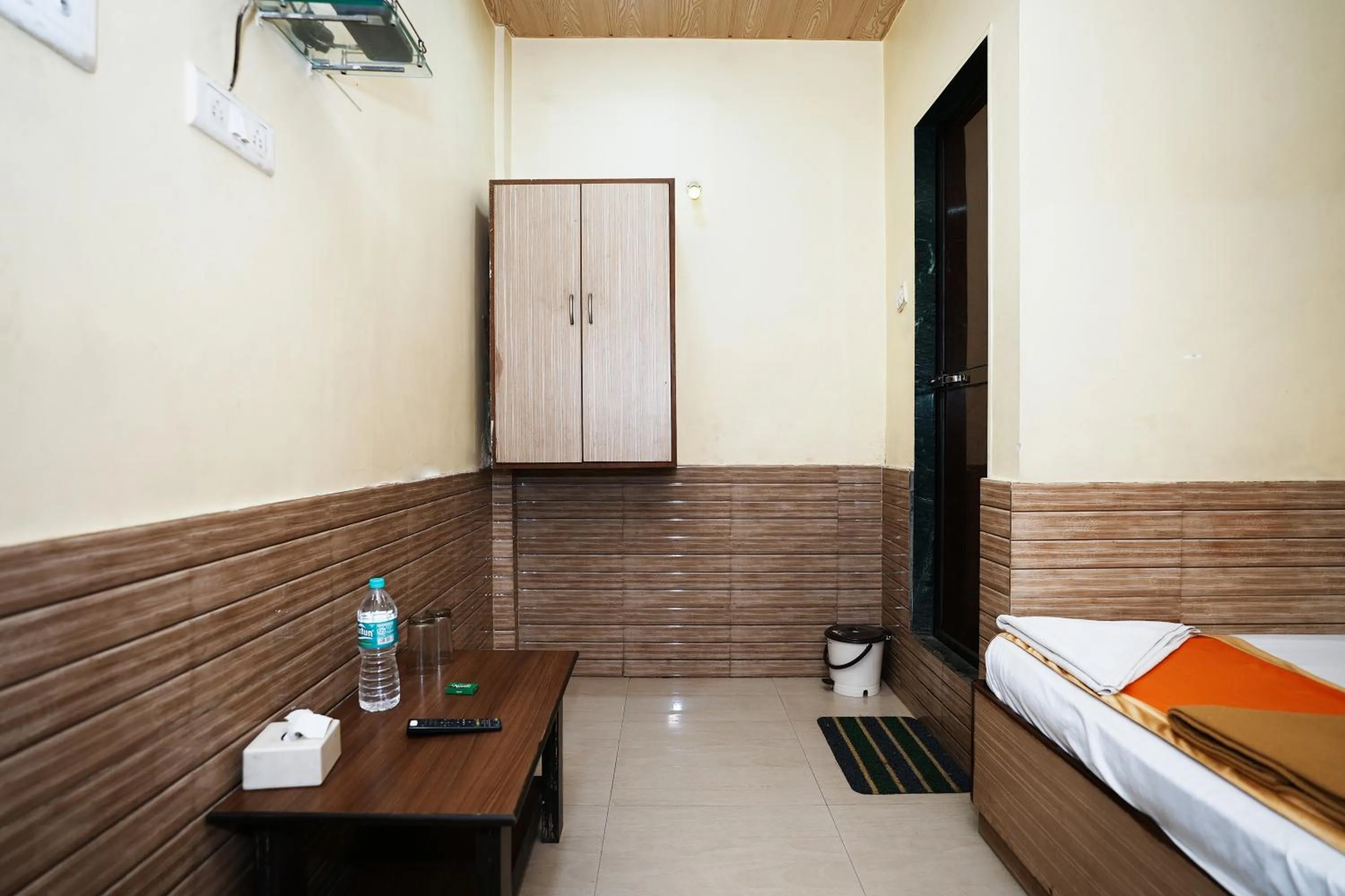 Bed in Hotel Sai Parikrama