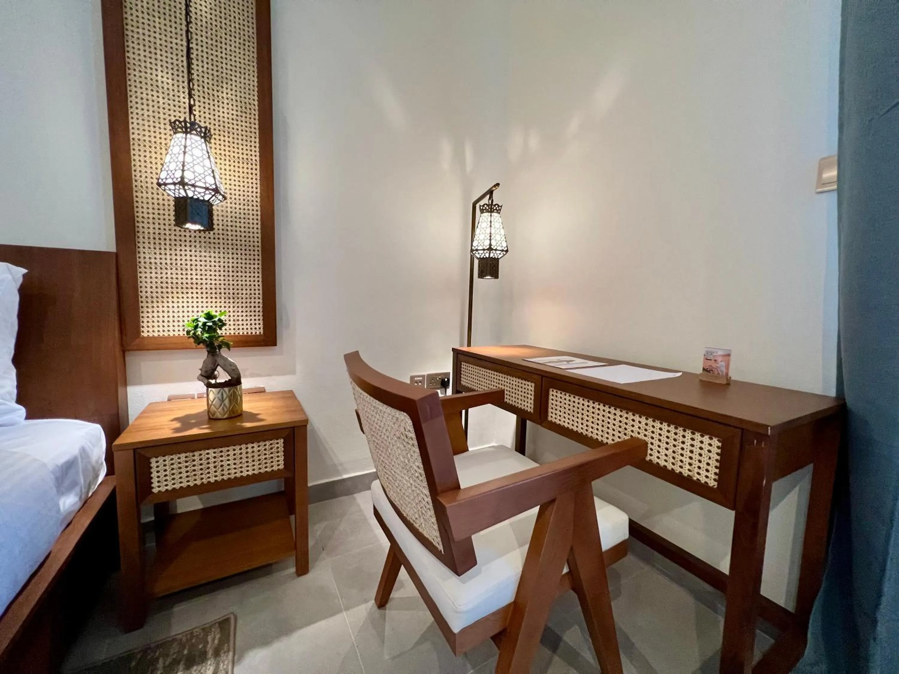 Seating area, Bed in Western Hotel Liwa