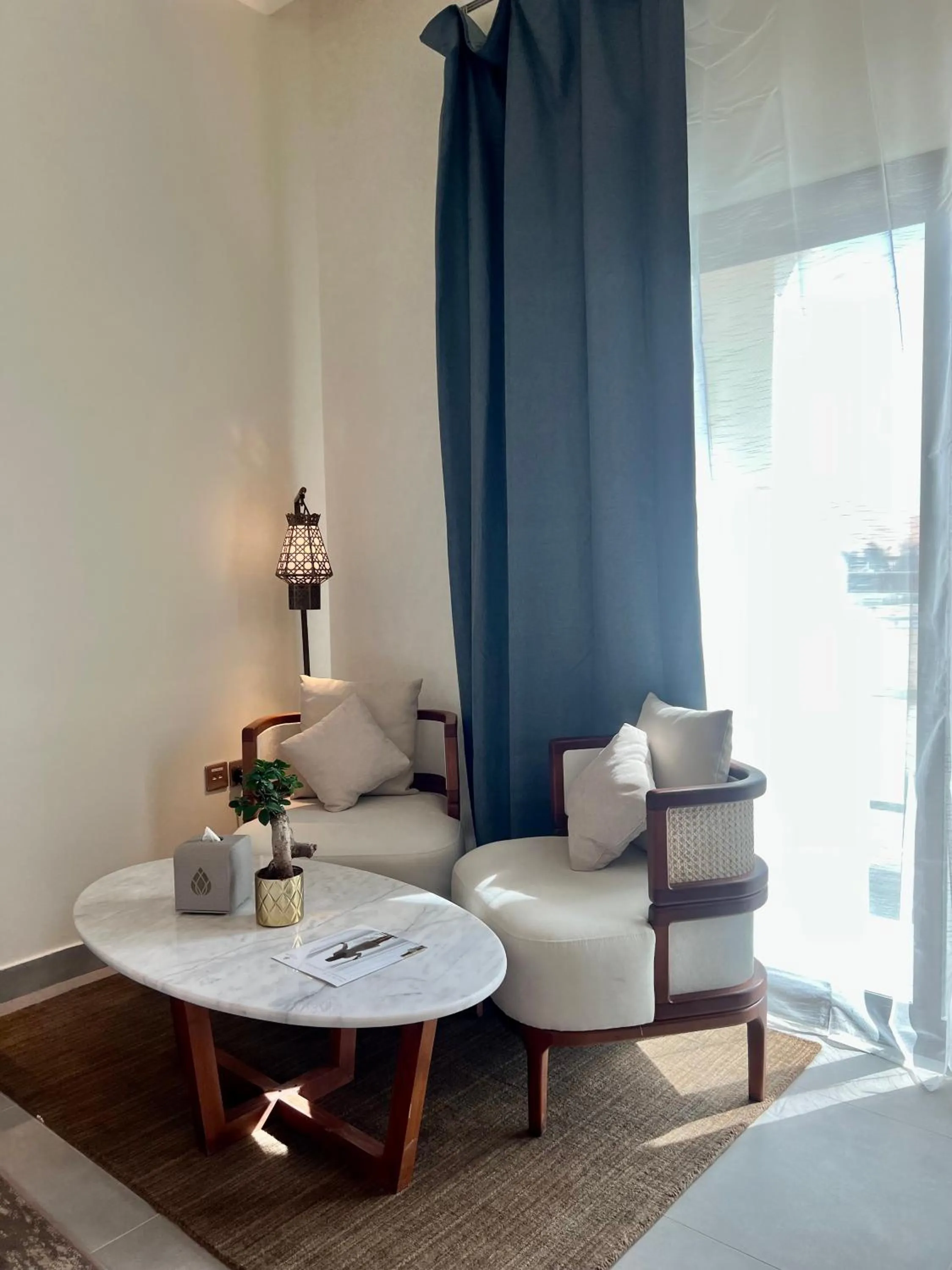 Seating area, Bed in Western Hotel Liwa