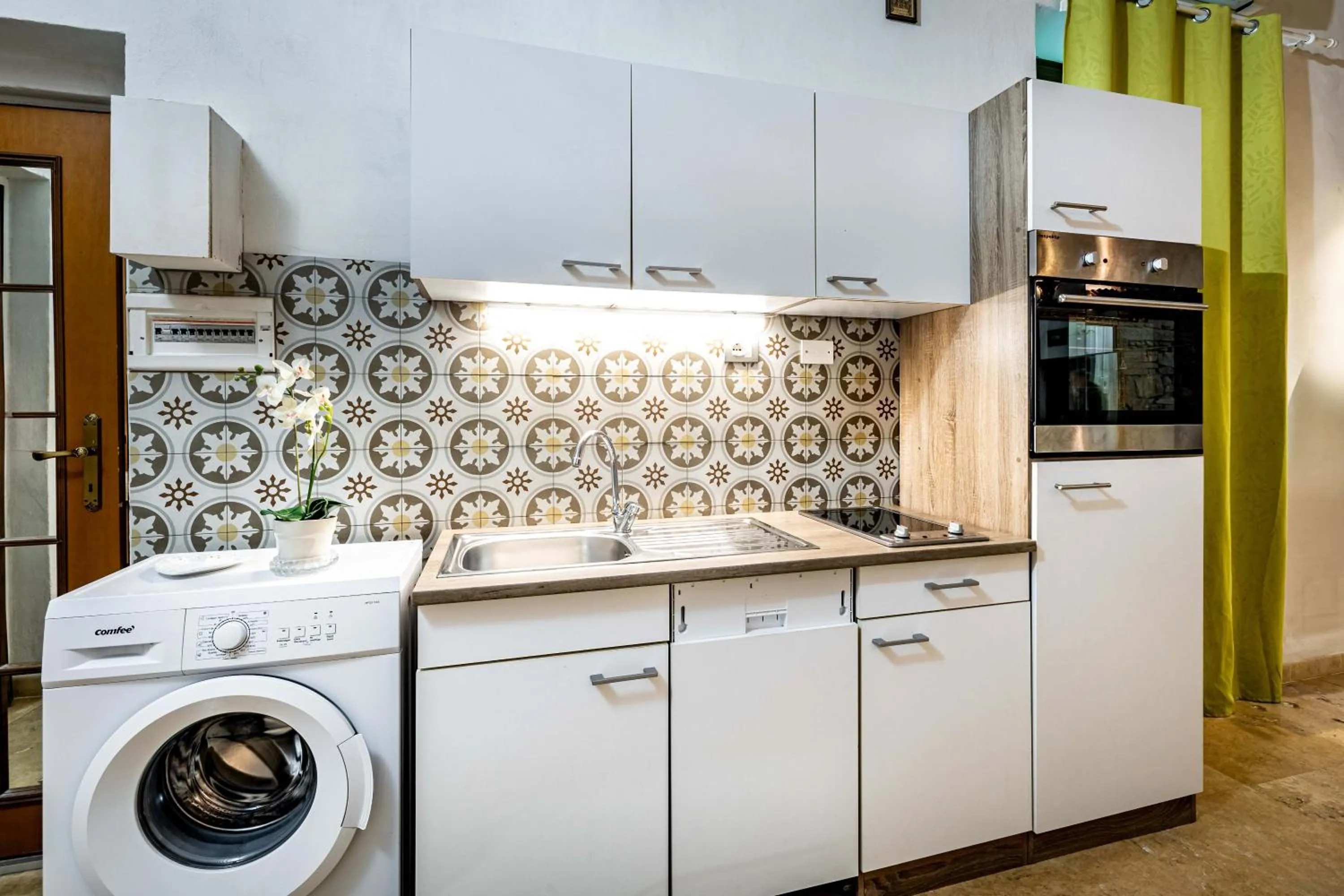 Kitchen or kitchenette in Roommo San Iacopino