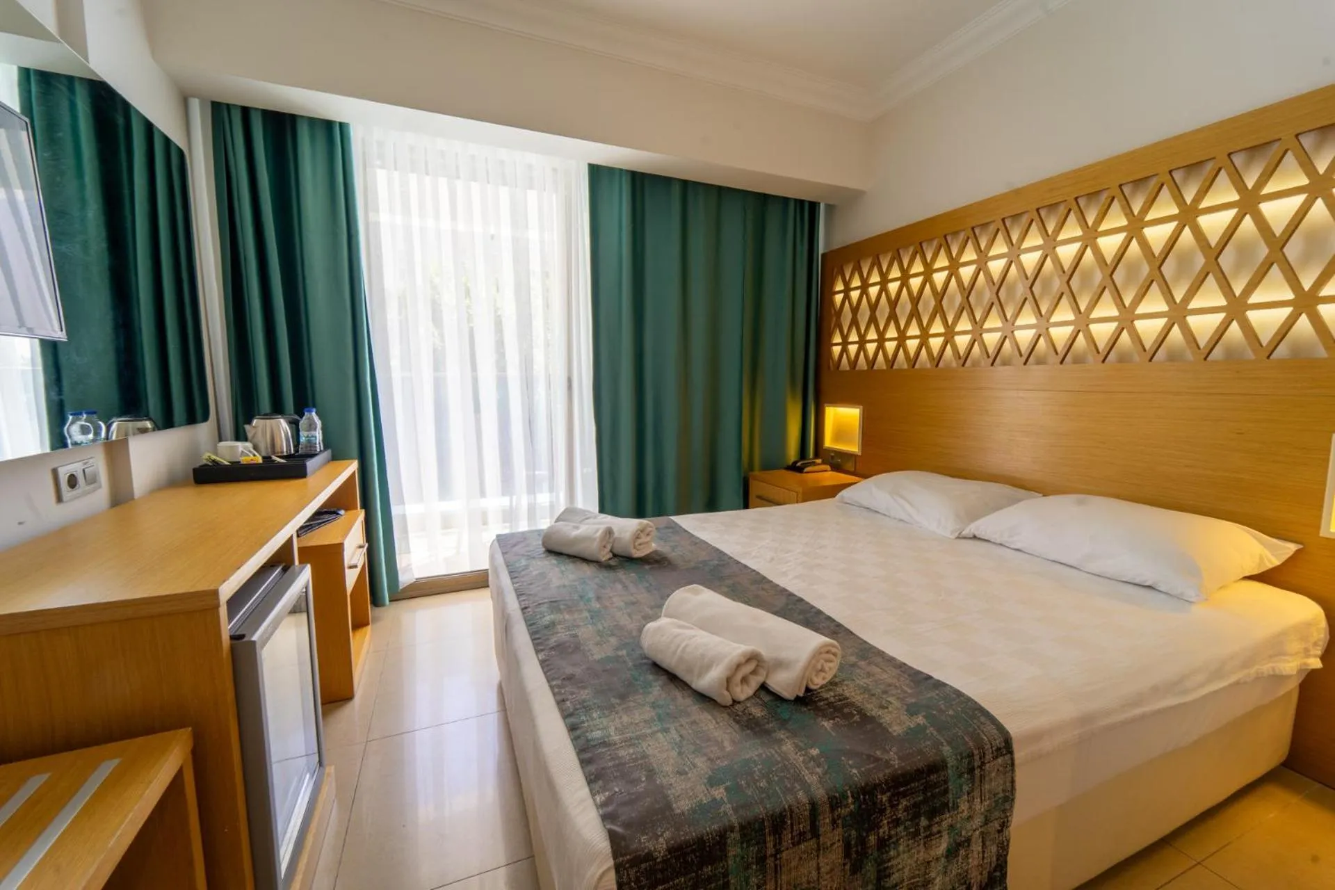 Bed in Aurasia Design Hotel