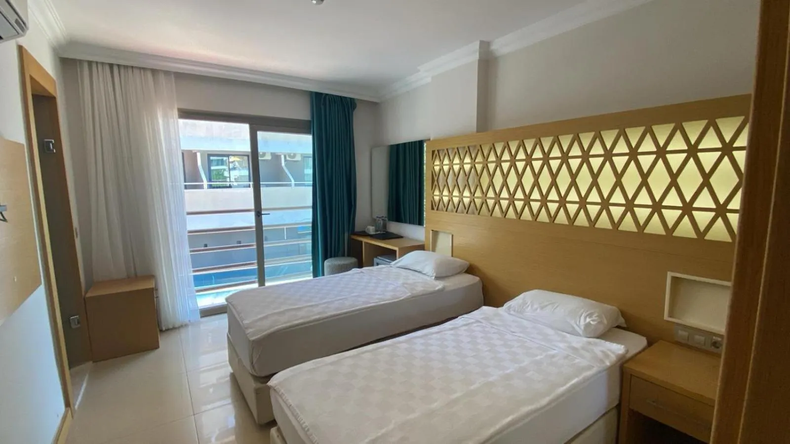Bed in Aurasia Design Hotel