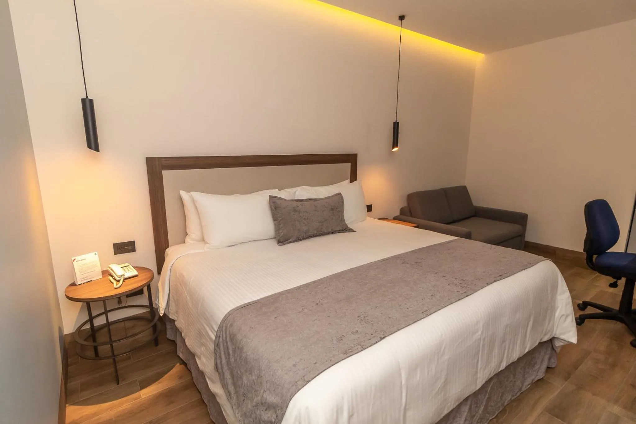 Bed in Hoteles Piedra Alta by De Los Perez