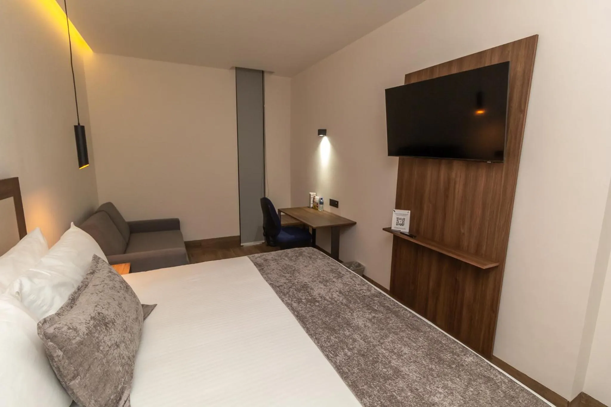 Bed in Hoteles Piedra Alta by De Los Perez