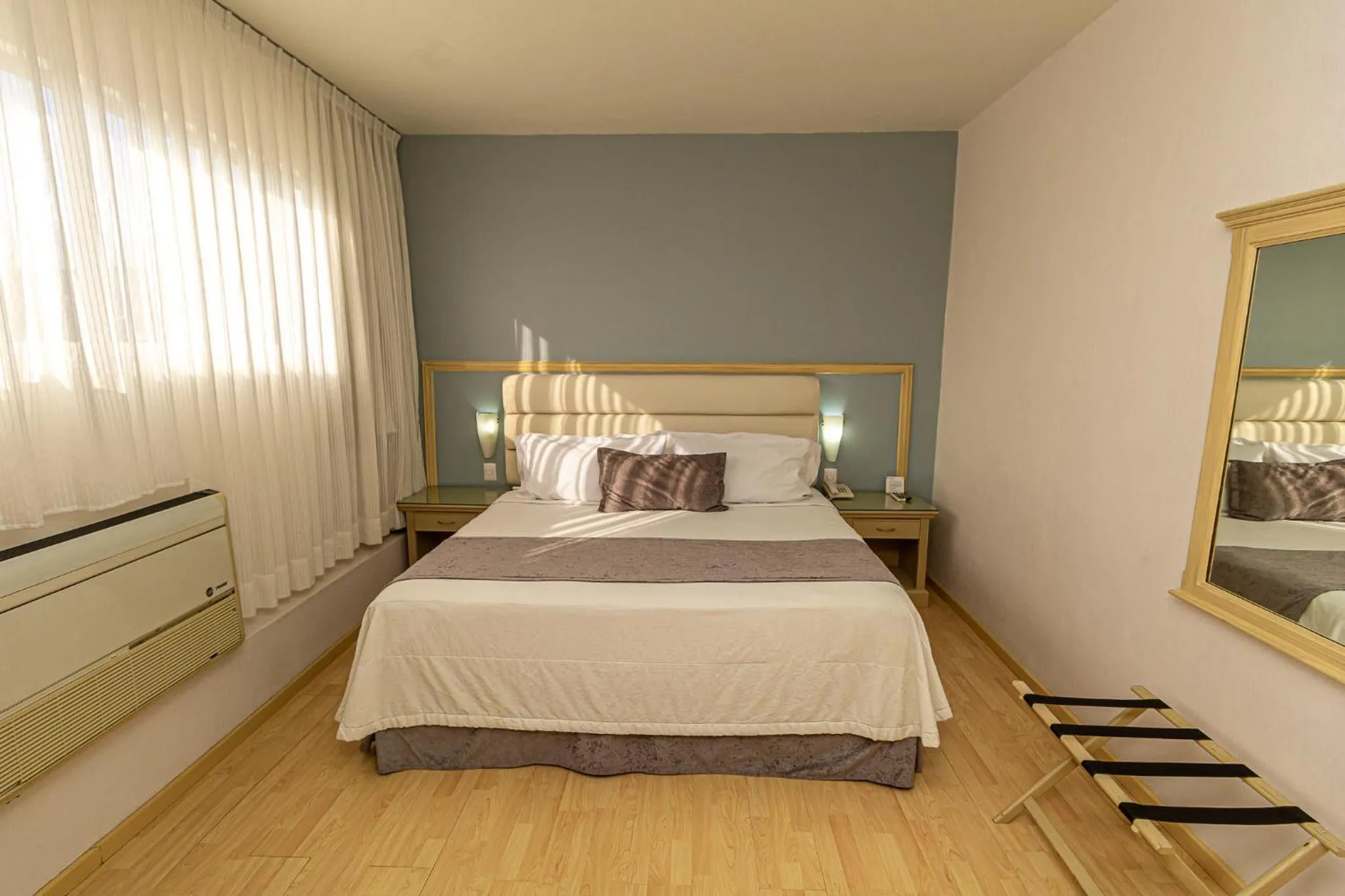 Bed in Hoteles Piedra Alta by De Los Perez