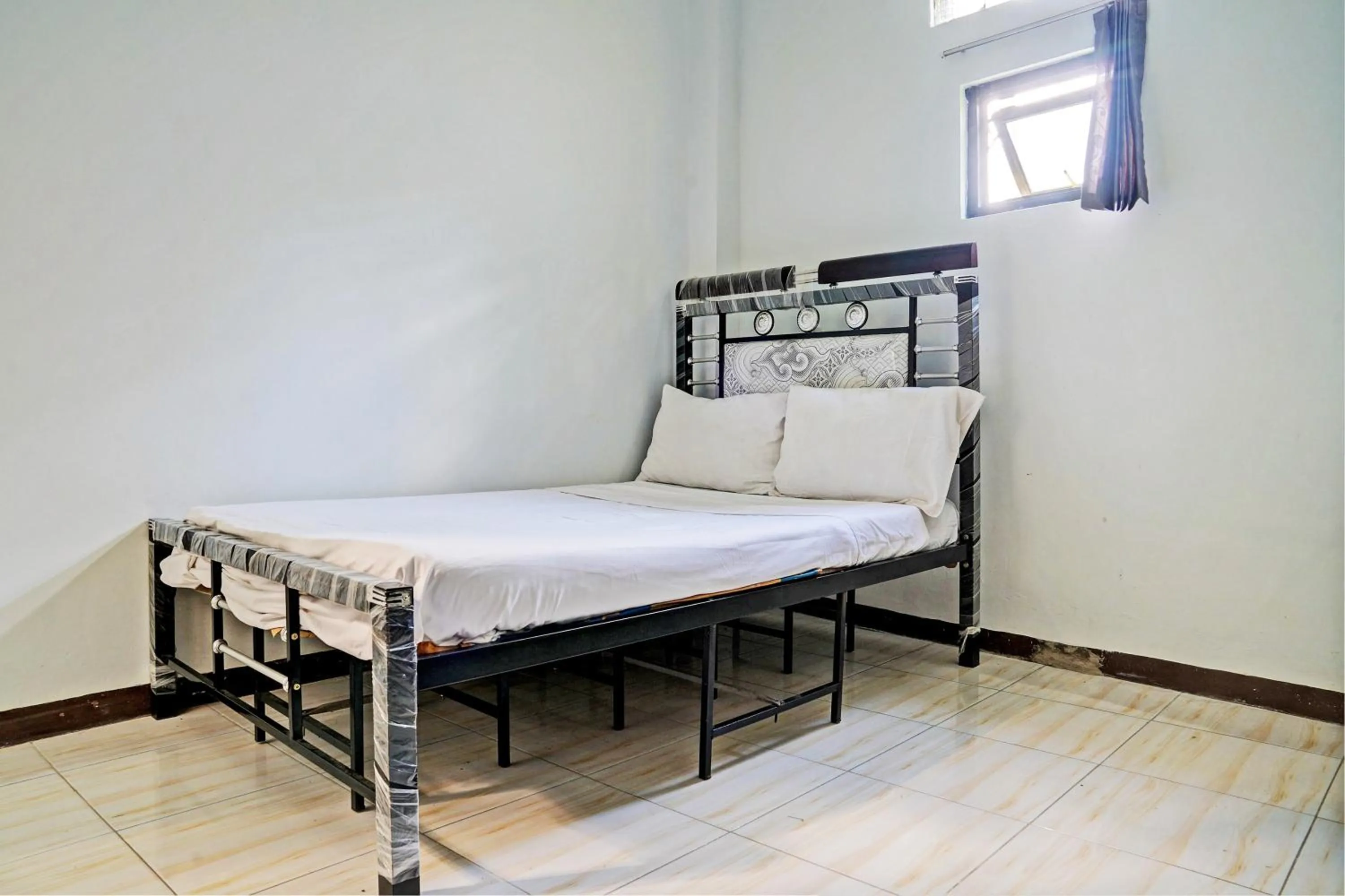 Bedroom in Hotel O Penginapan Hj Lilis 2 Syariah