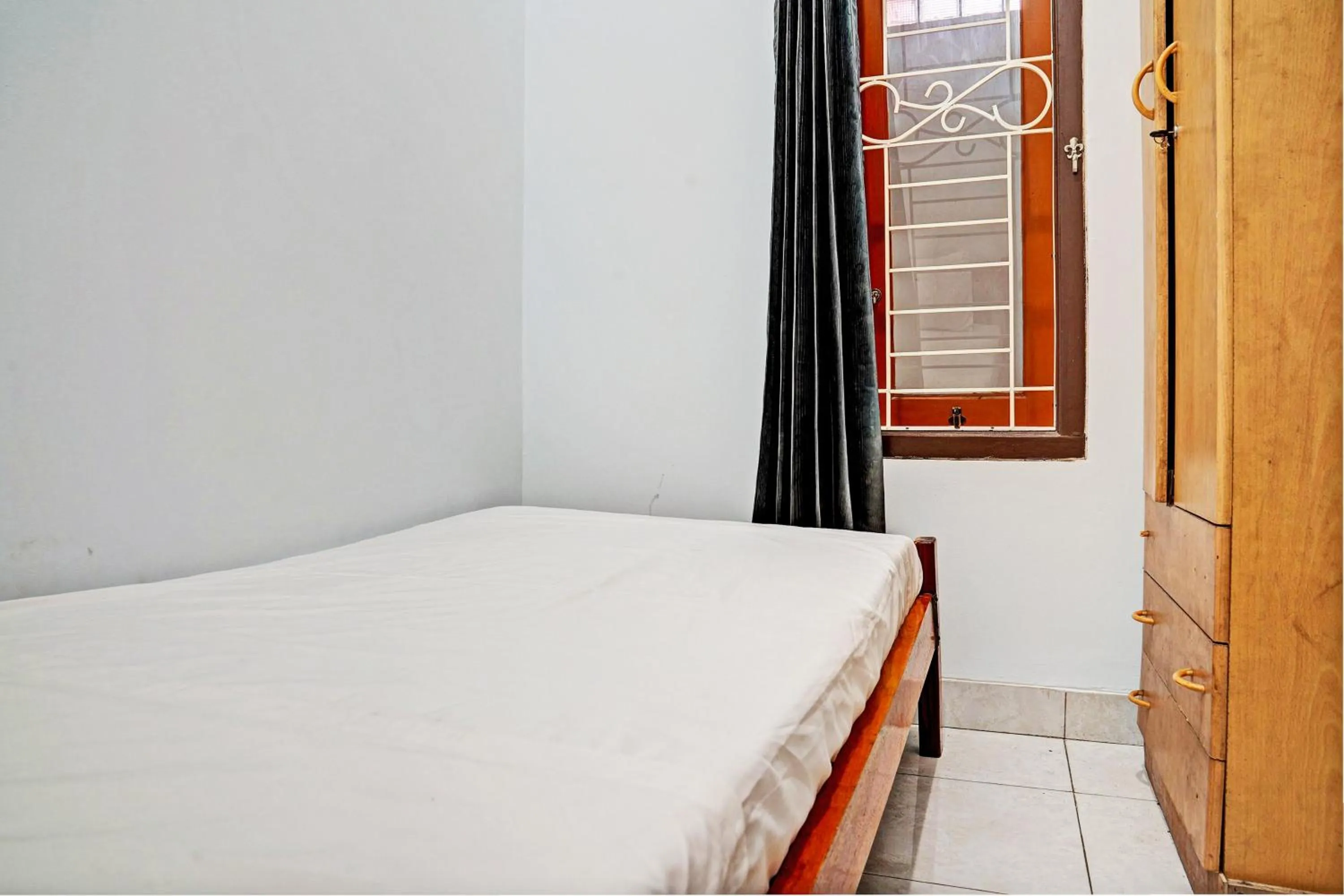 Bedroom in Hotel O Penginapan Hj Lilis 2 Syariah