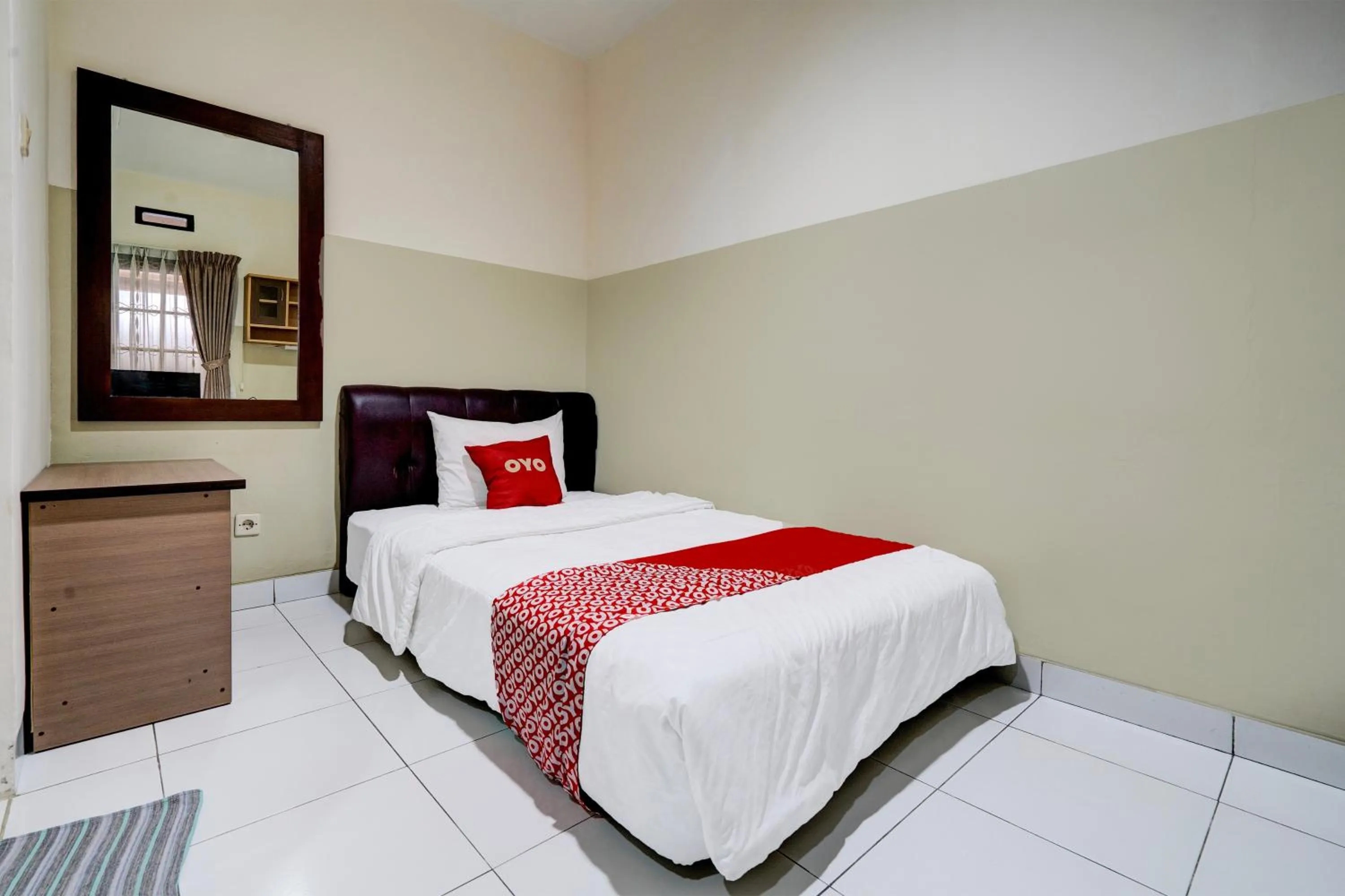 Bedroom in Hotel O Sukamulya Homestay