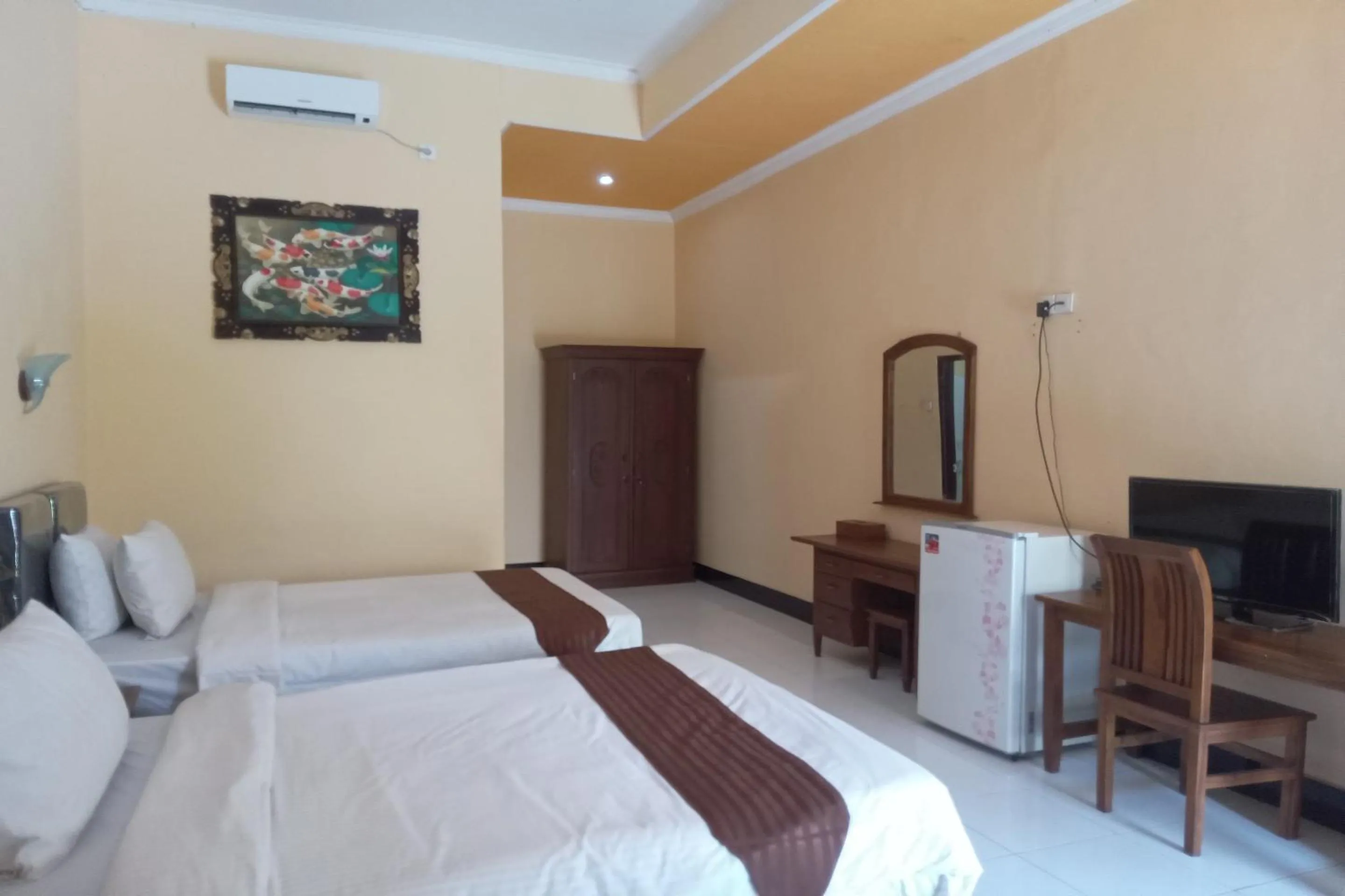 Bedroom, Bed in Capital O 93391 Golden Manggis Hotel Near SMKN 1 Lingsar
