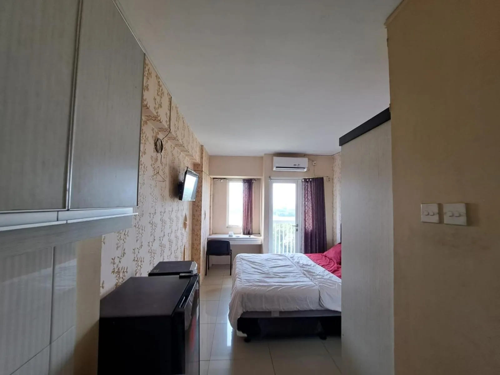 Bedroom, Bed in Hotel O Apartement Grand Sentraland By King Property