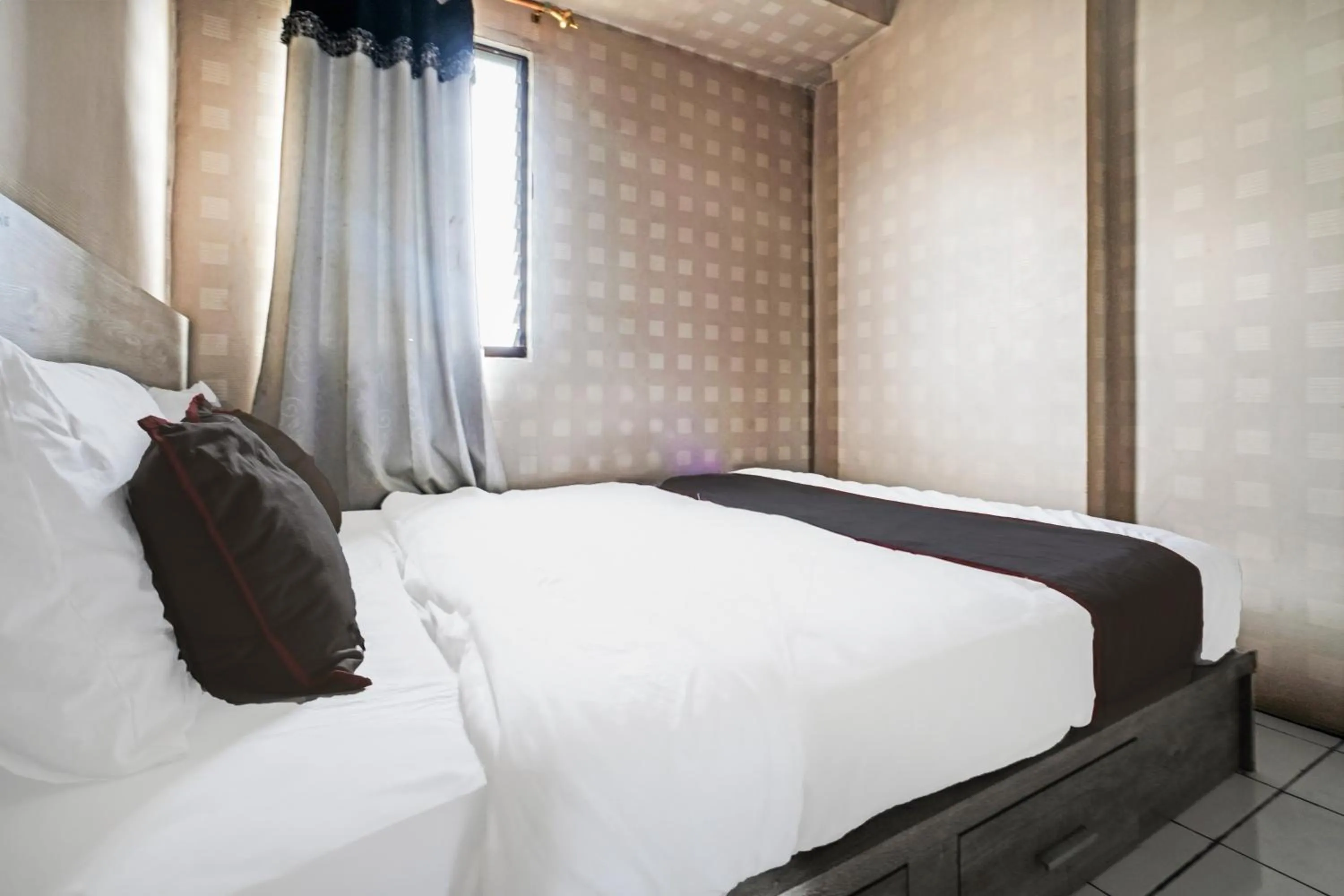 Bedroom in OYO 93365 Apartement Gateway By Sarana Cipta Mahakarya Ii