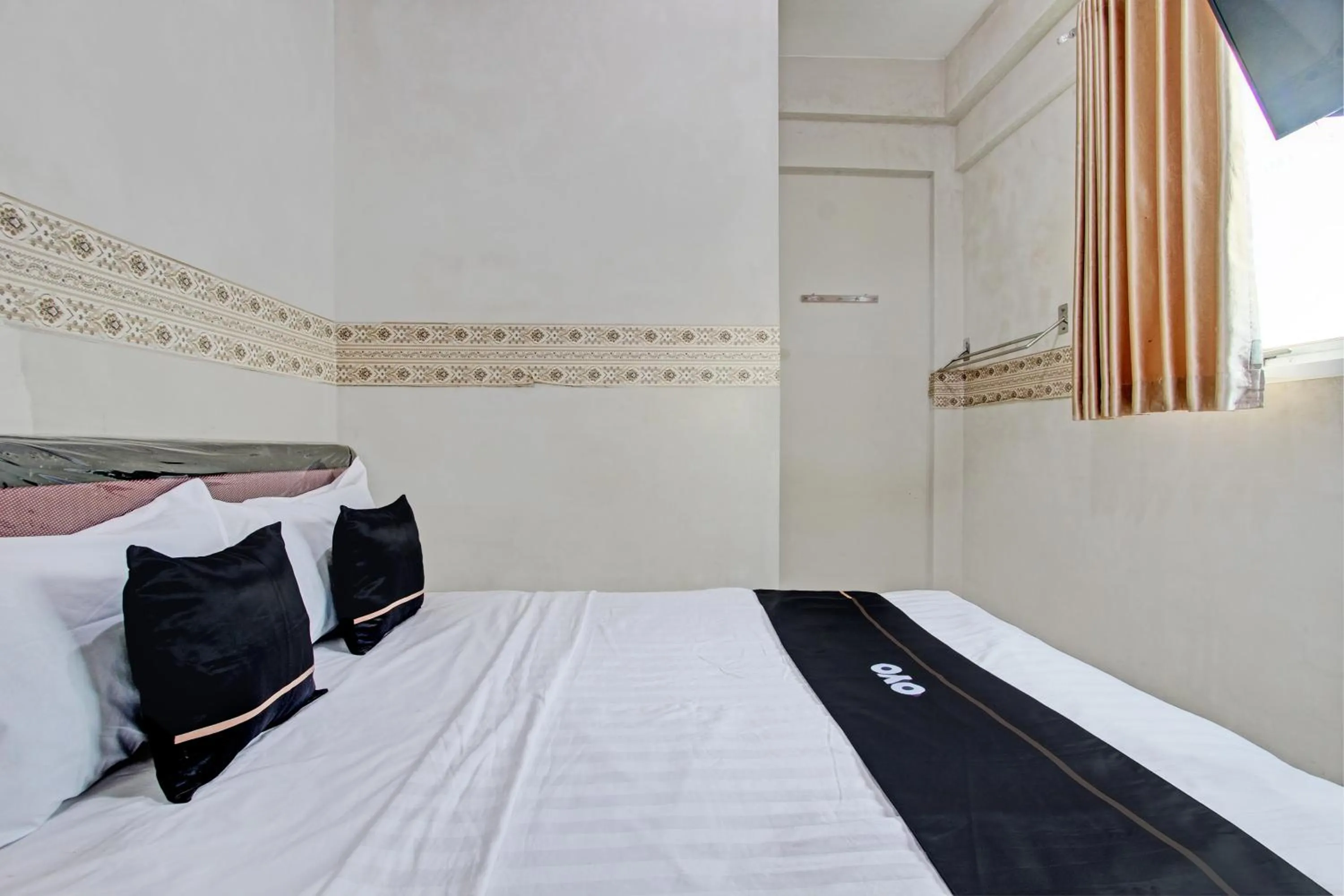 Bedroom, Bed in Capital O 93361 Dynasty Inn Syariah