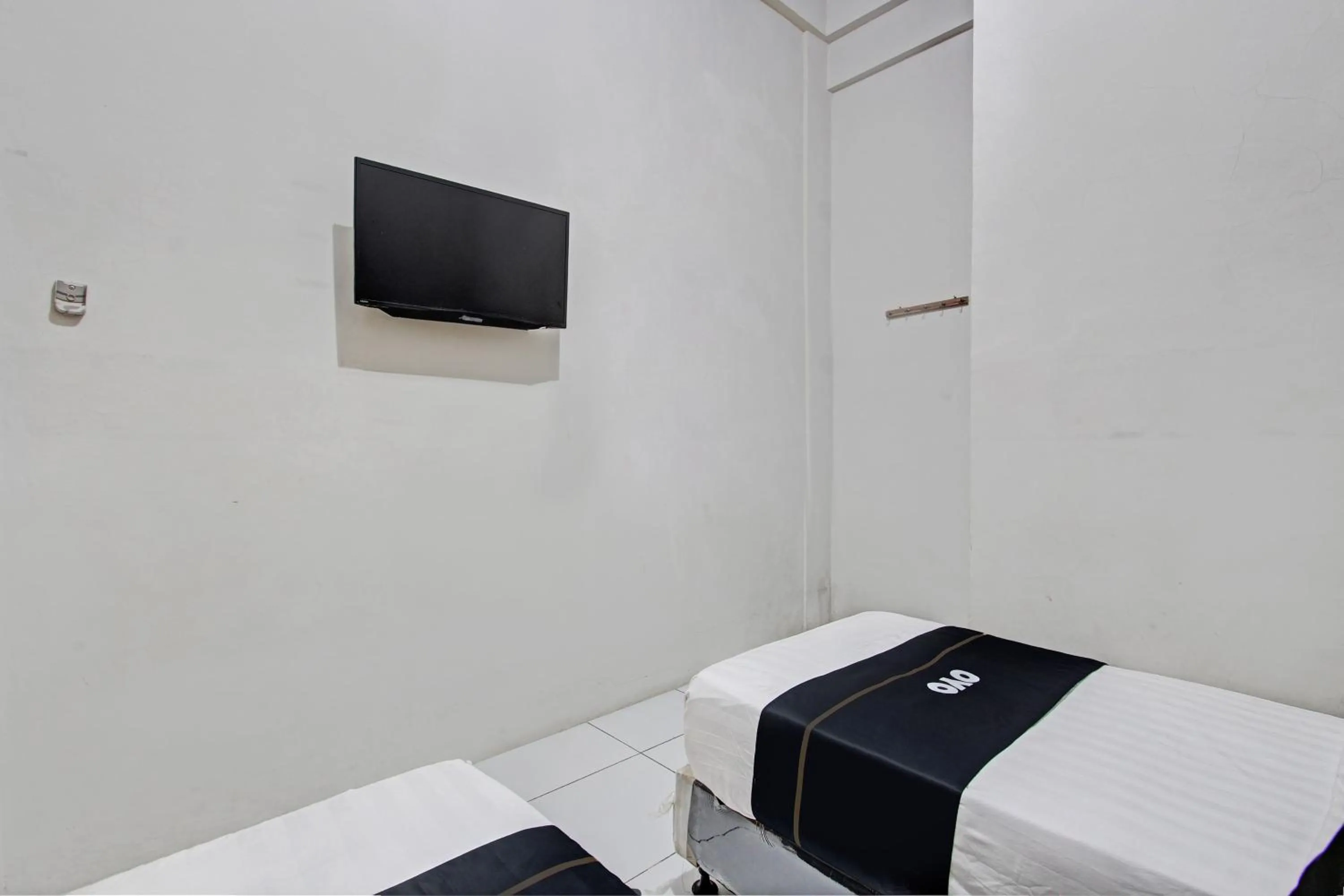 Bedroom, Bed in Capital O 93361 Dynasty Inn Syariah