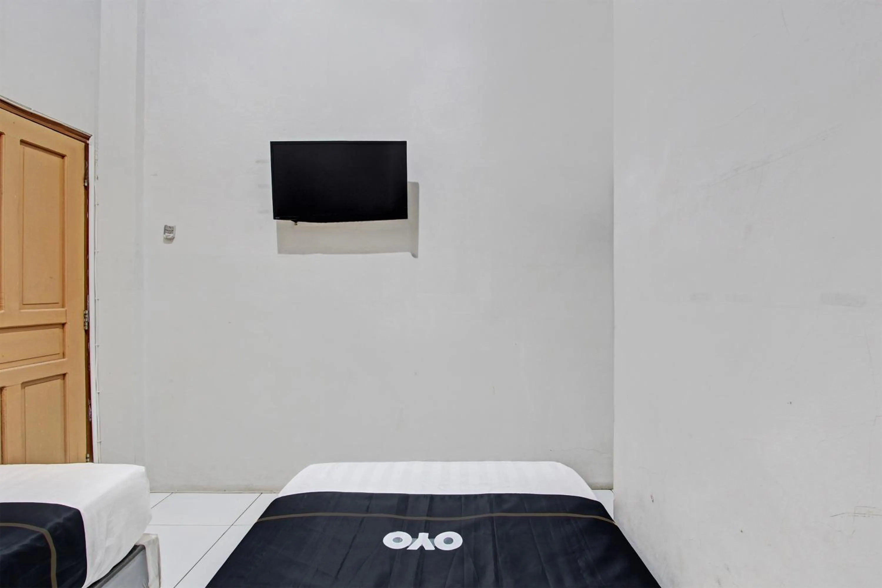 Bedroom, Bed in Capital O 93361 Dynasty Inn Syariah