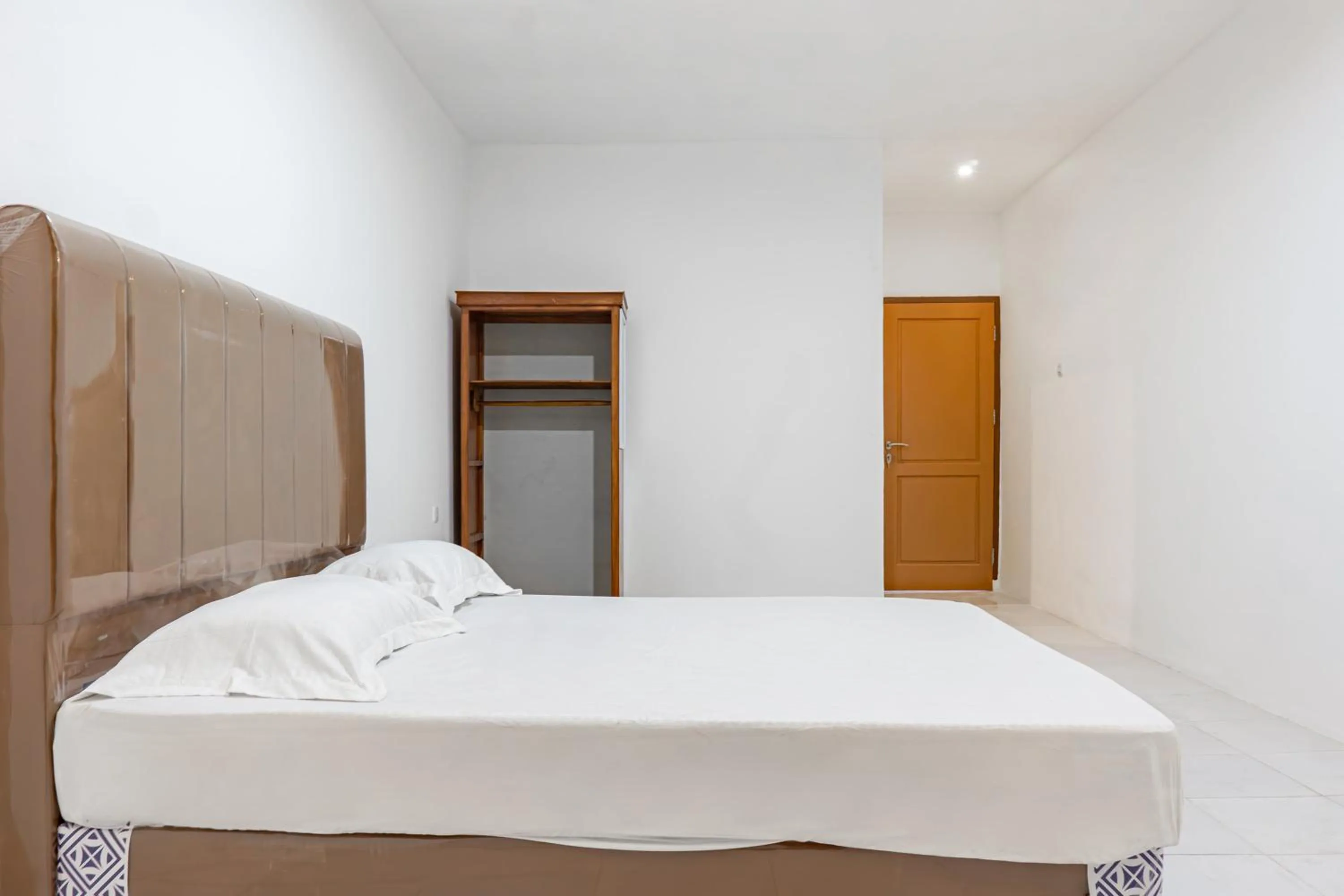 Bedroom, Bed in Hotel O Enjoy Homestay & Cafe