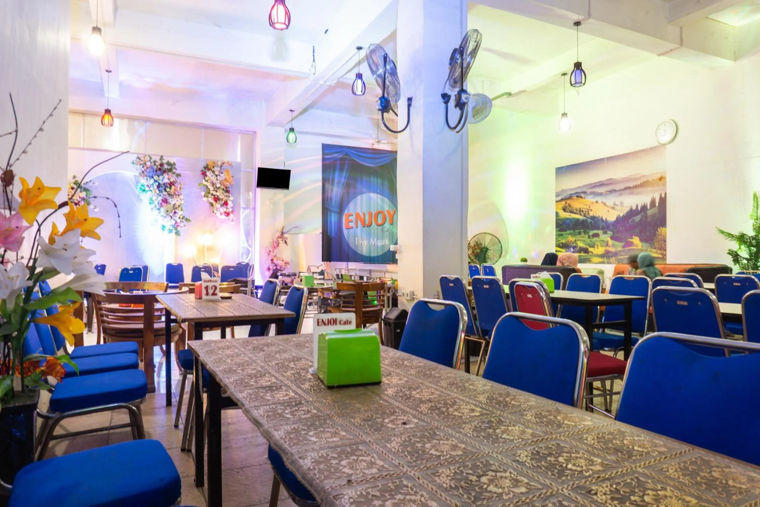 Lobby or reception in Hotel O Enjoy Homestay & Cafe