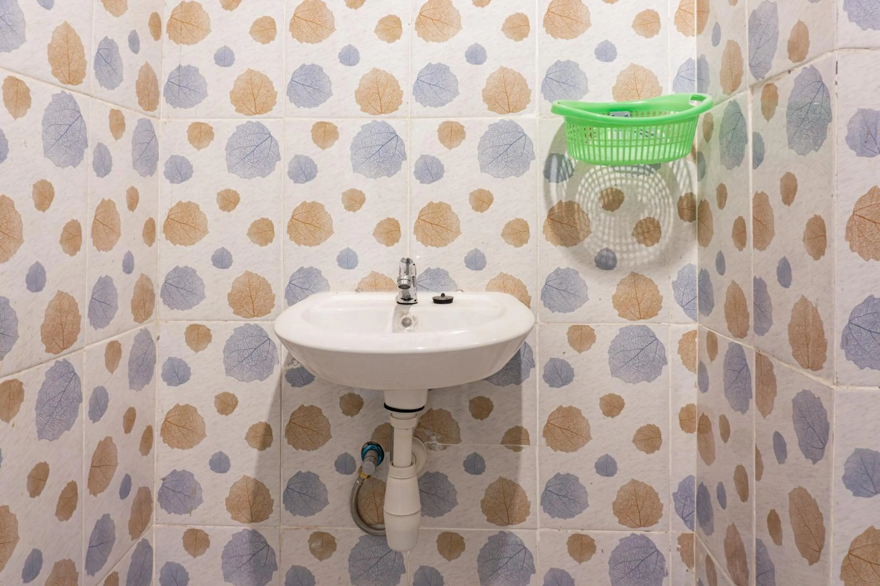 Bathroom in Hotel O Enjoy Homestay & Cafe