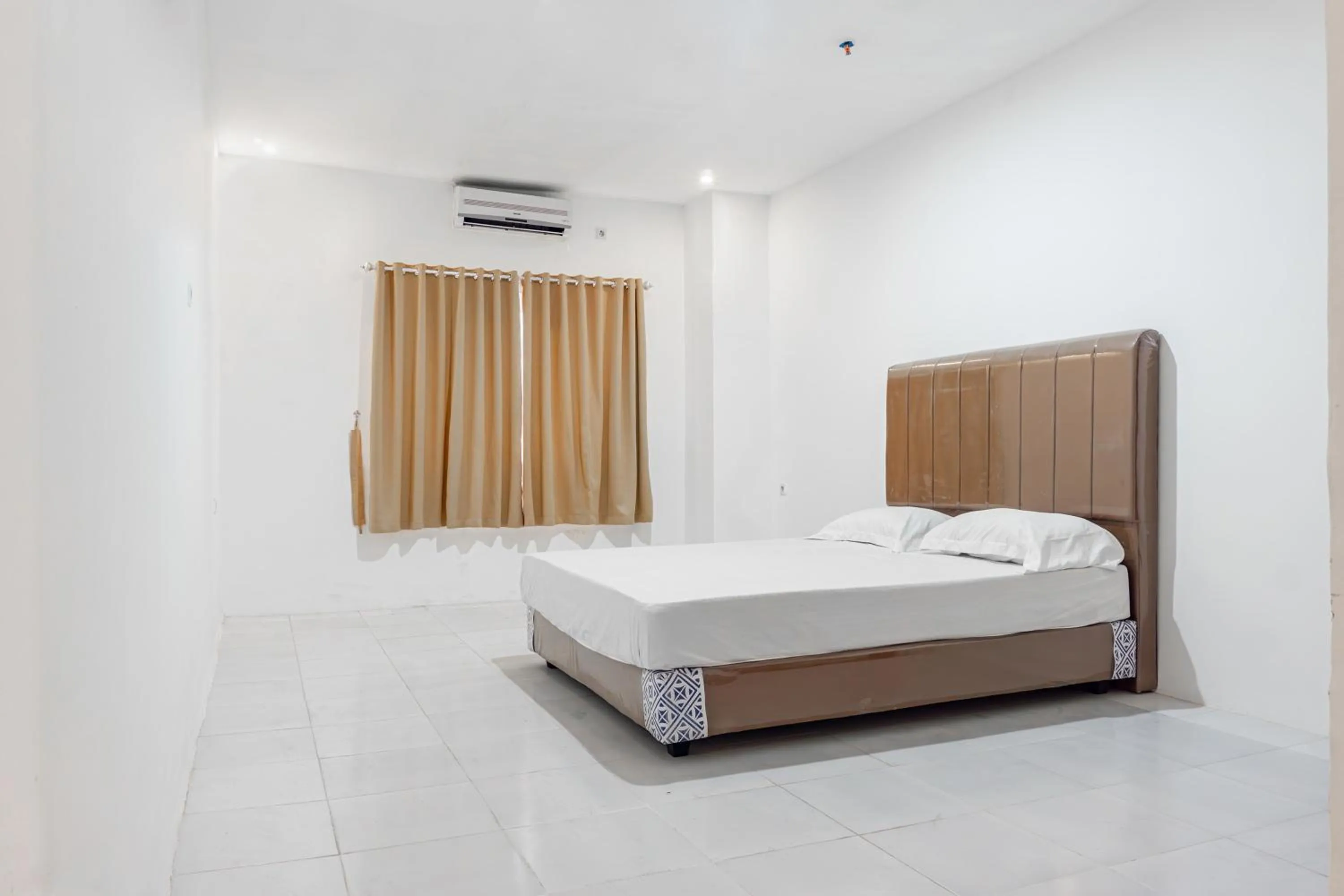 Bedroom, Bed in Hotel O Enjoy Homestay & Cafe