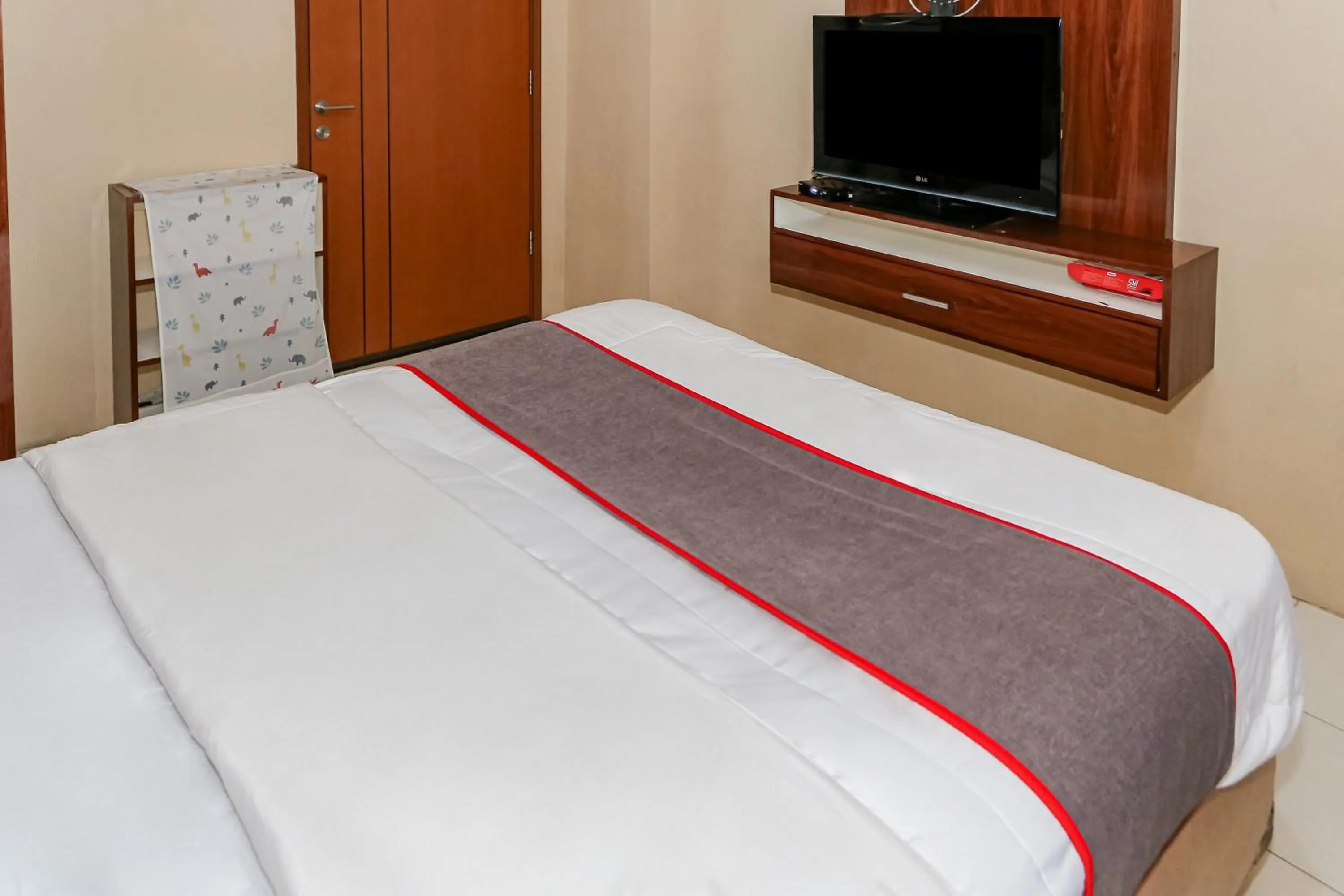 Bedroom in Capital O 93371 Pelangi Residence 5