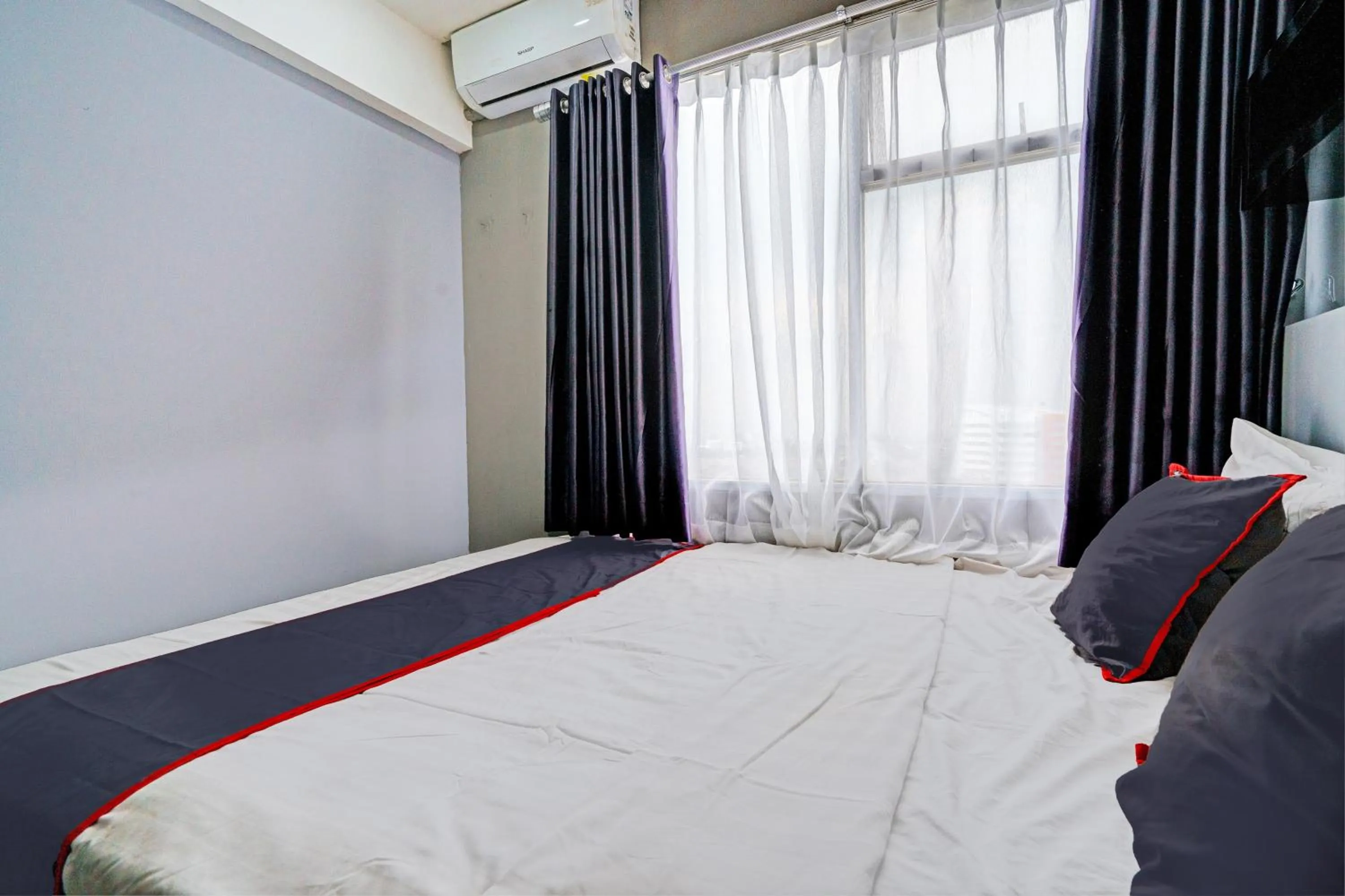 Bedroom, Bed in Hotel O Apartement Grand Sentraland By Rai Property