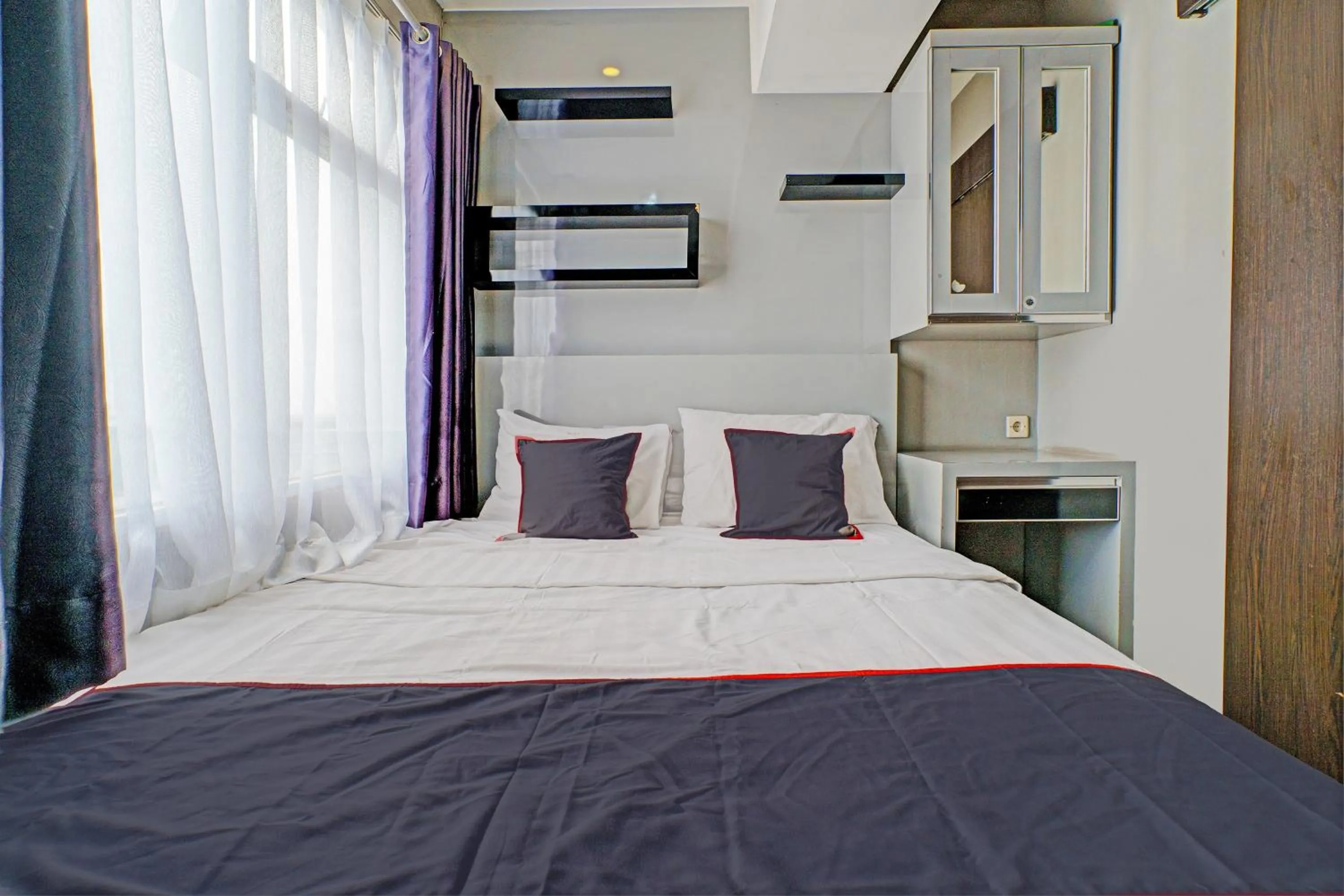 Bedroom, Bed in Hotel O Apartement Grand Sentraland By Rai Property