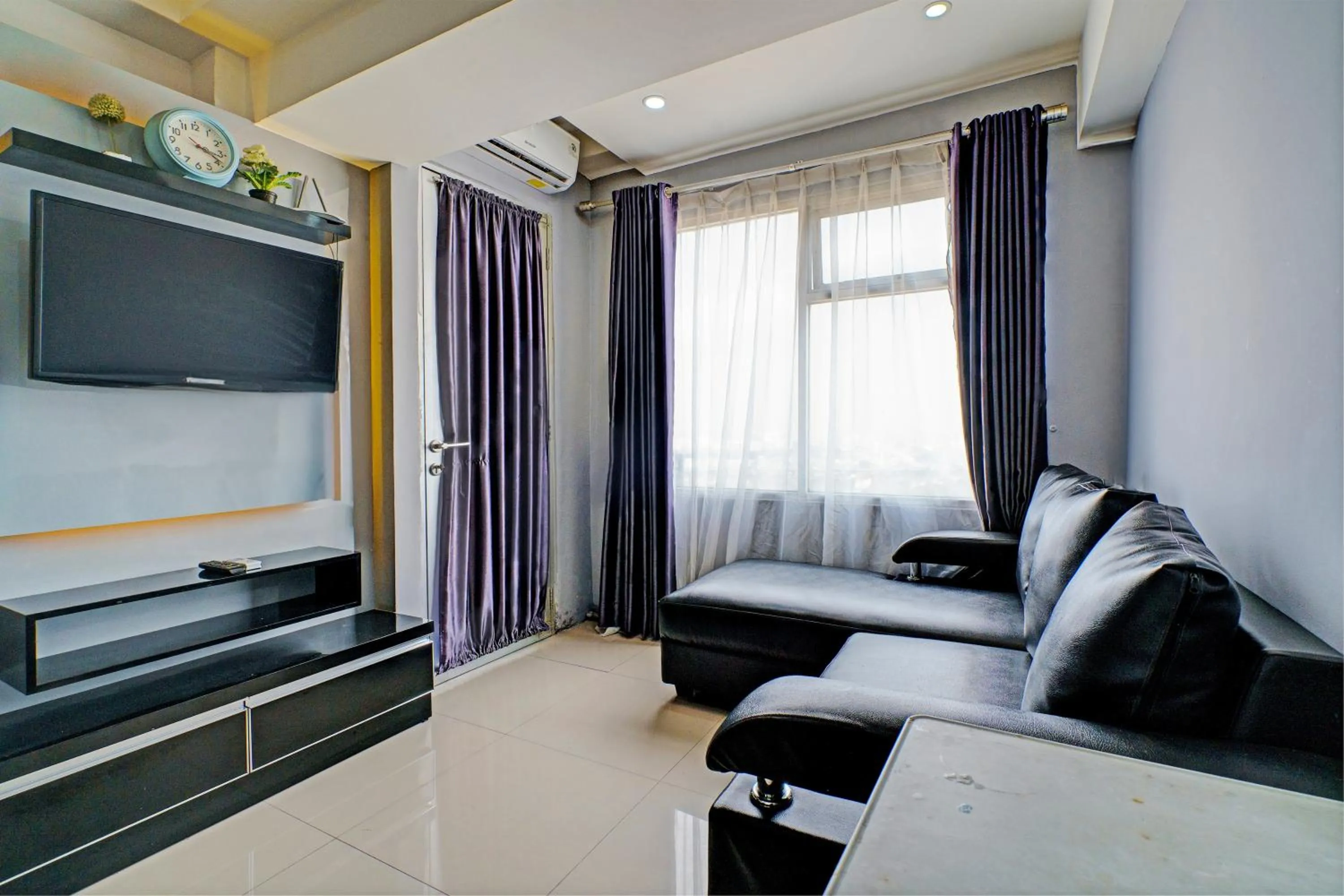 Bedroom in Hotel O Apartement Grand Sentraland By Rai Property