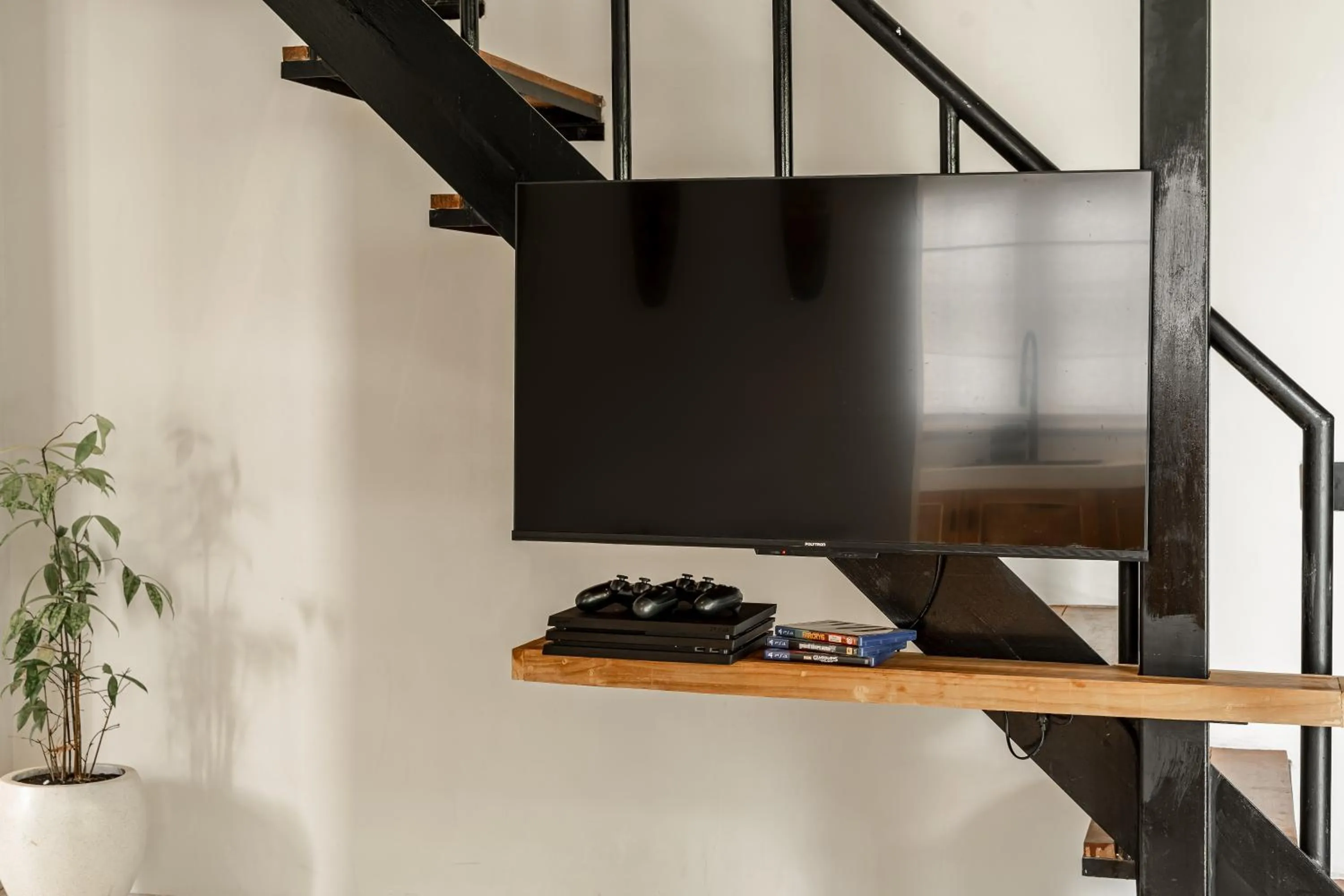 TV and multimedia in Sarang Apartments by EVDEkimi - Rice field escape with Yoga lounge, Lush garden - Long stay extras