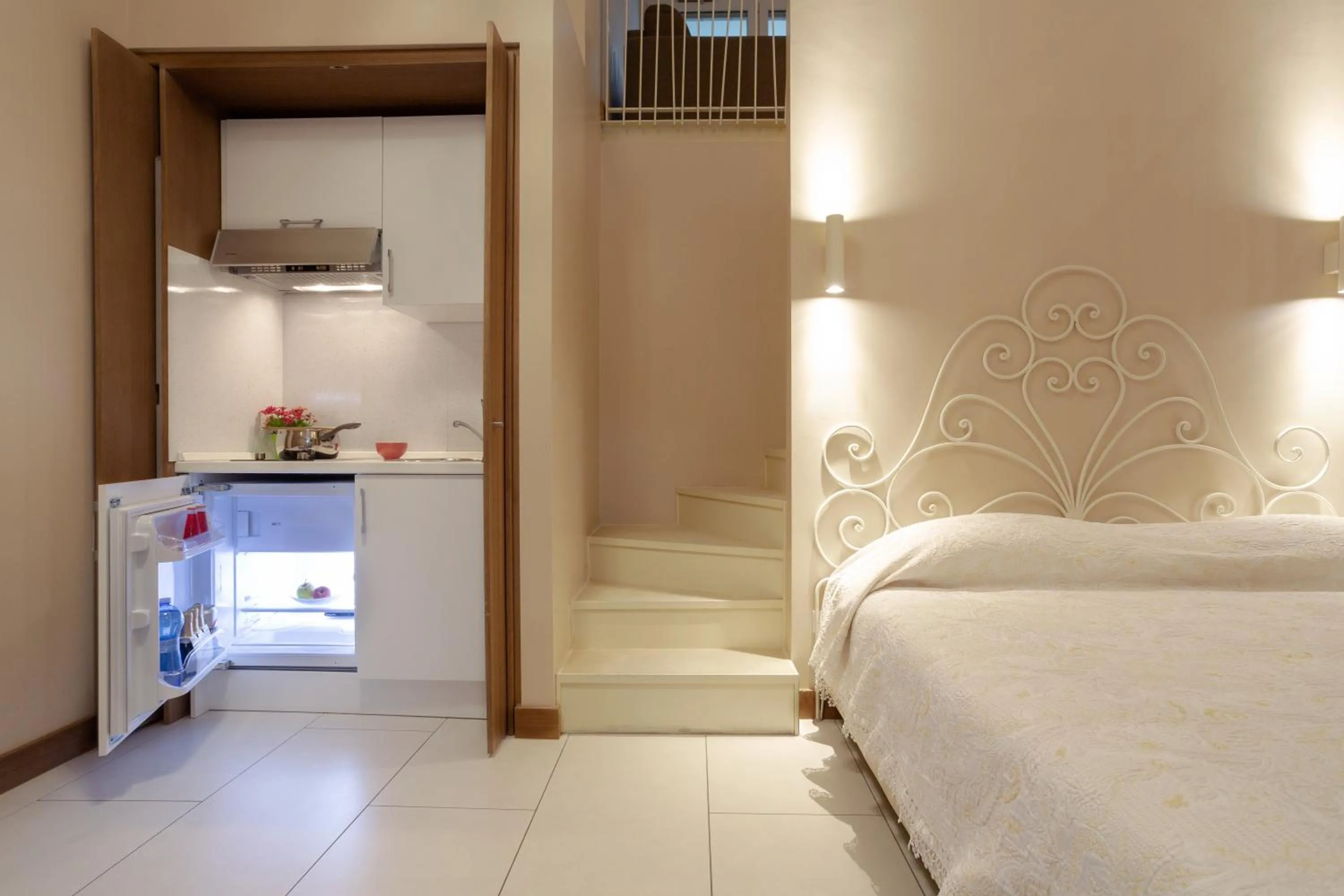 Kitchen or kitchenette, Bed in La Castellana Loft Hotel