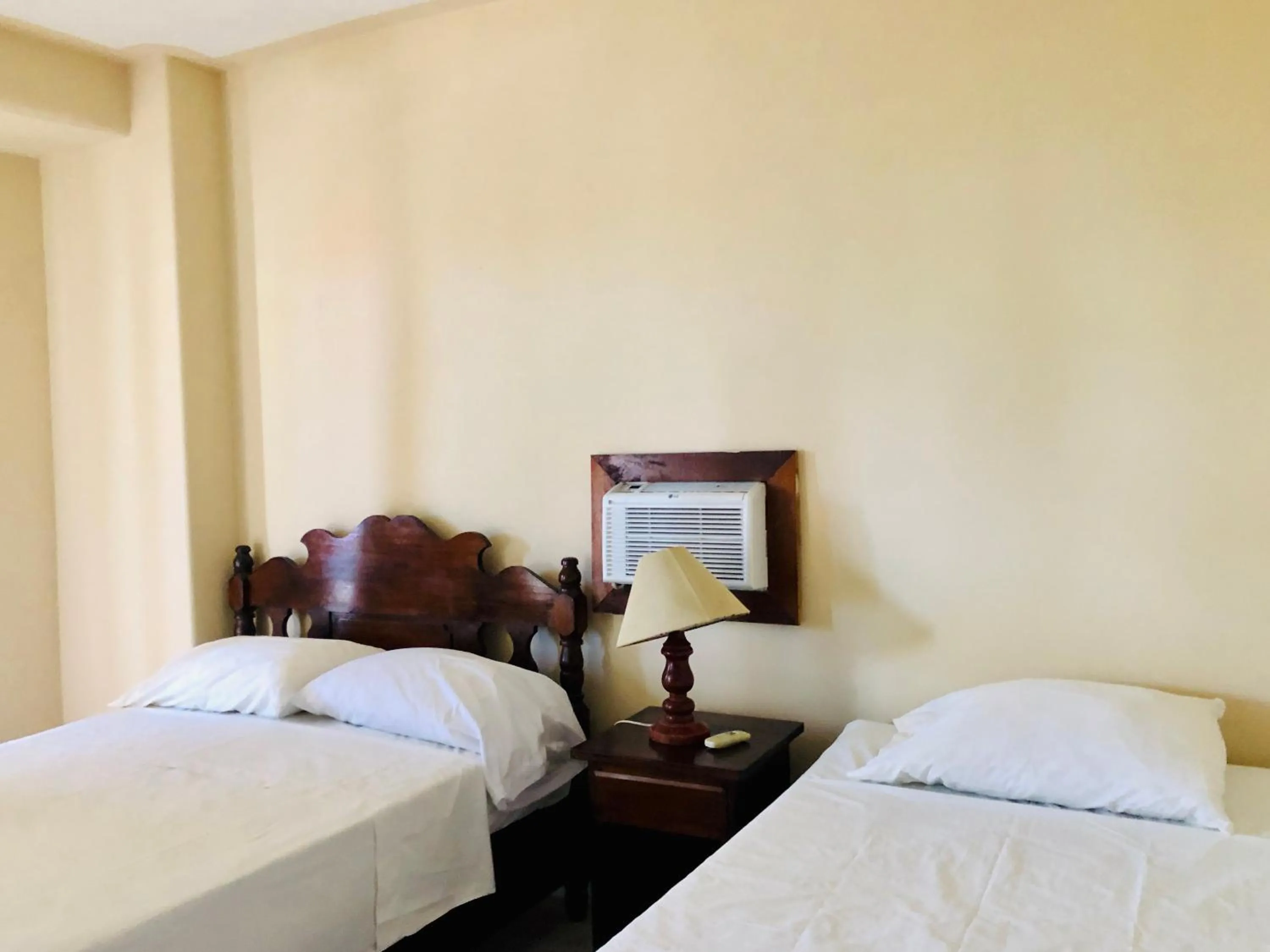 Bed in Hotel Paraíso del Pescador by Rotamundos