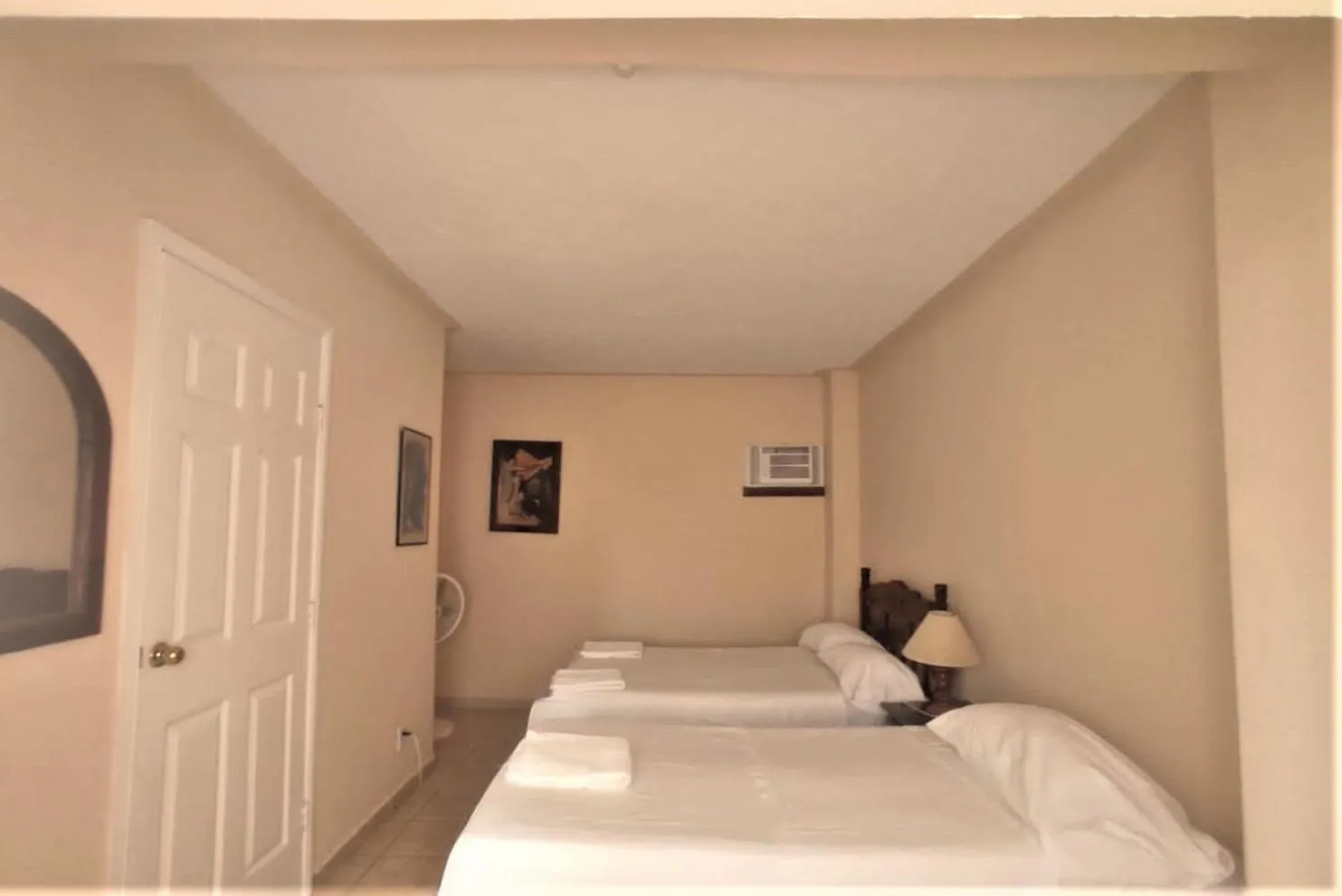 Bed in Hotel Paraíso del Pescador by Rotamundos