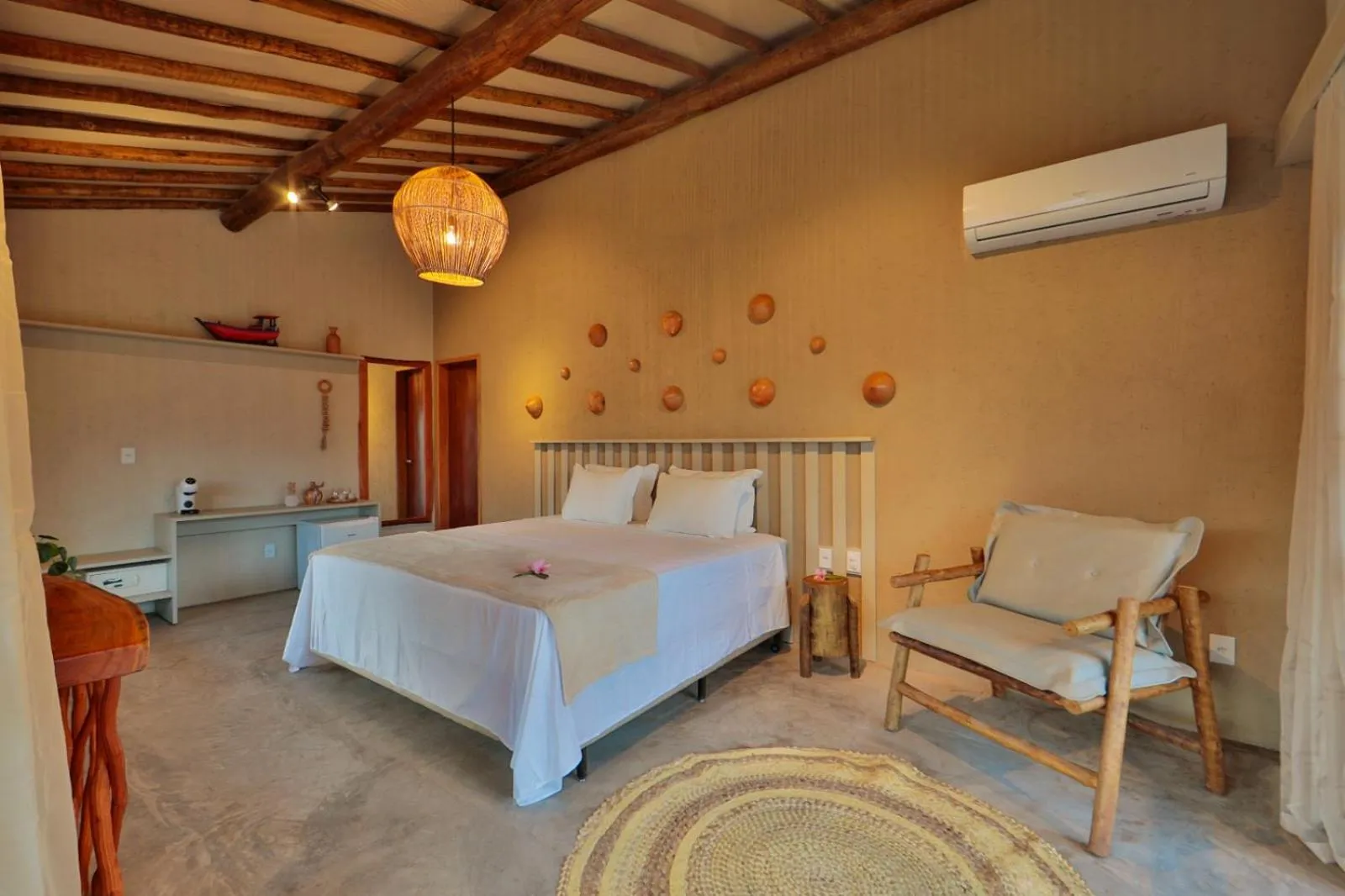 Bed in MONAN BOUTIQUE HOTEL