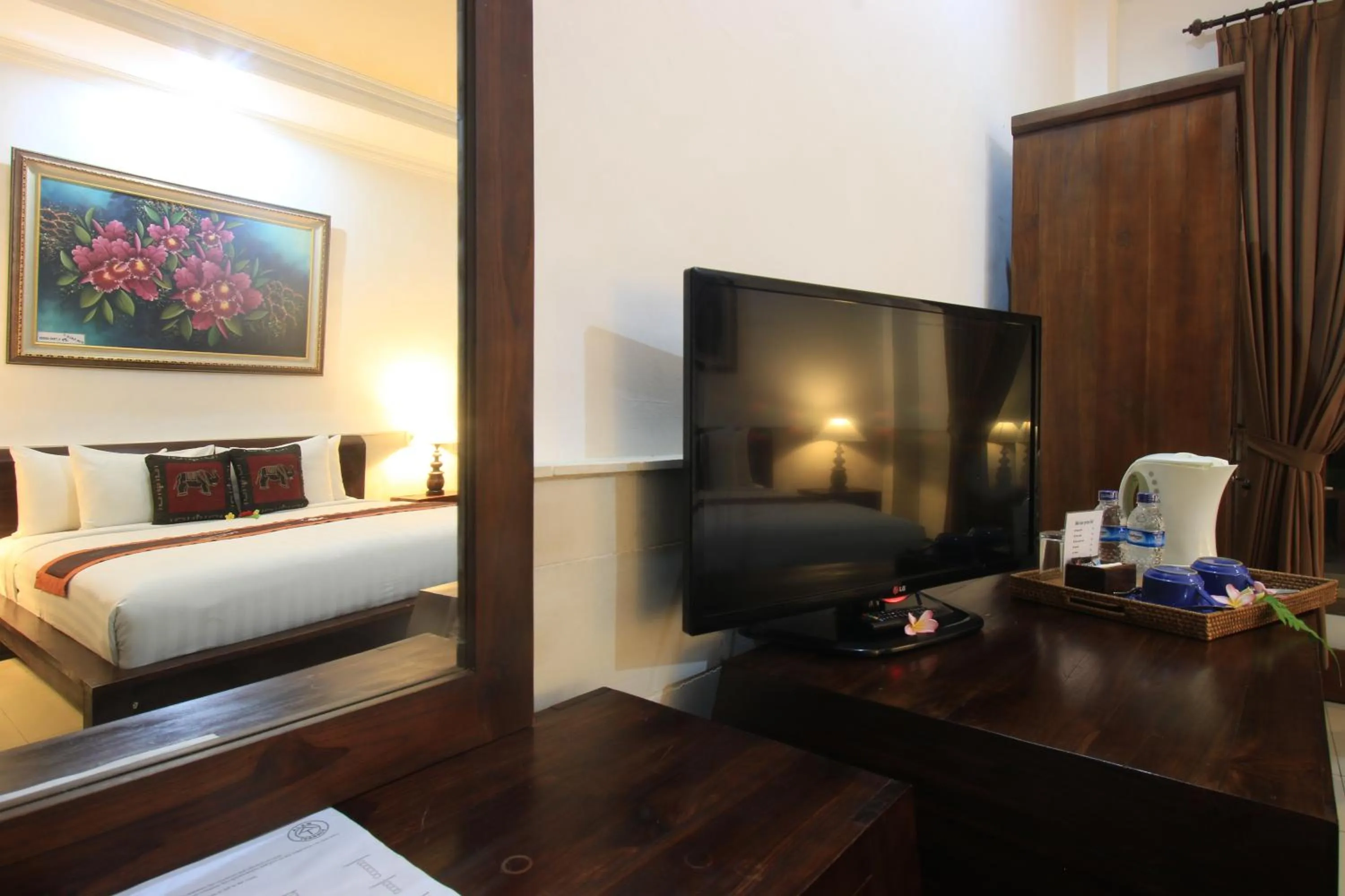 Communal lounge/ TV room, Bed in Alam Terrace Cottages