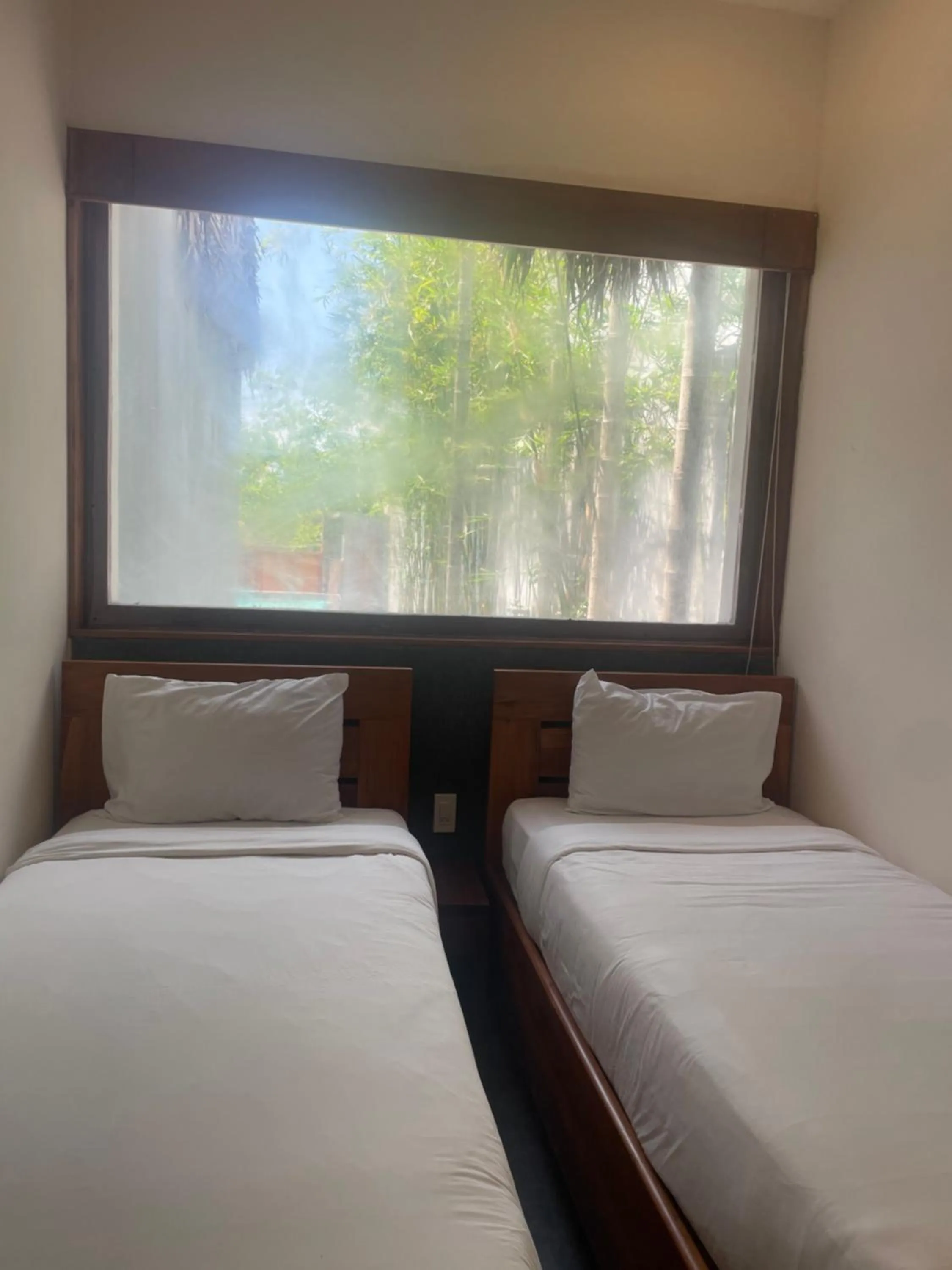 Bed in Palm View Villa