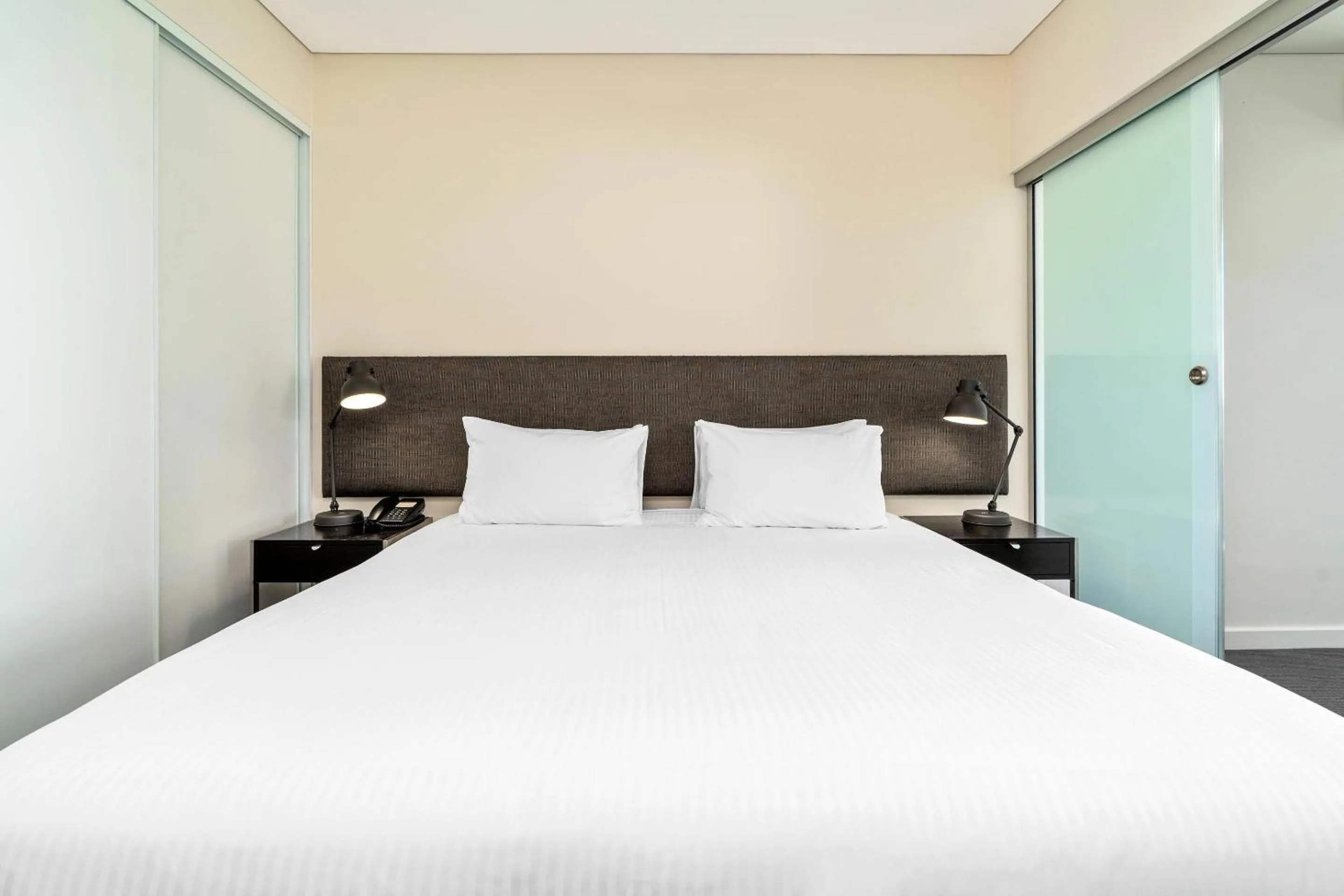 Bedroom, Bed in Terminus Apartment Hotel, an Ascend Collection Hotel