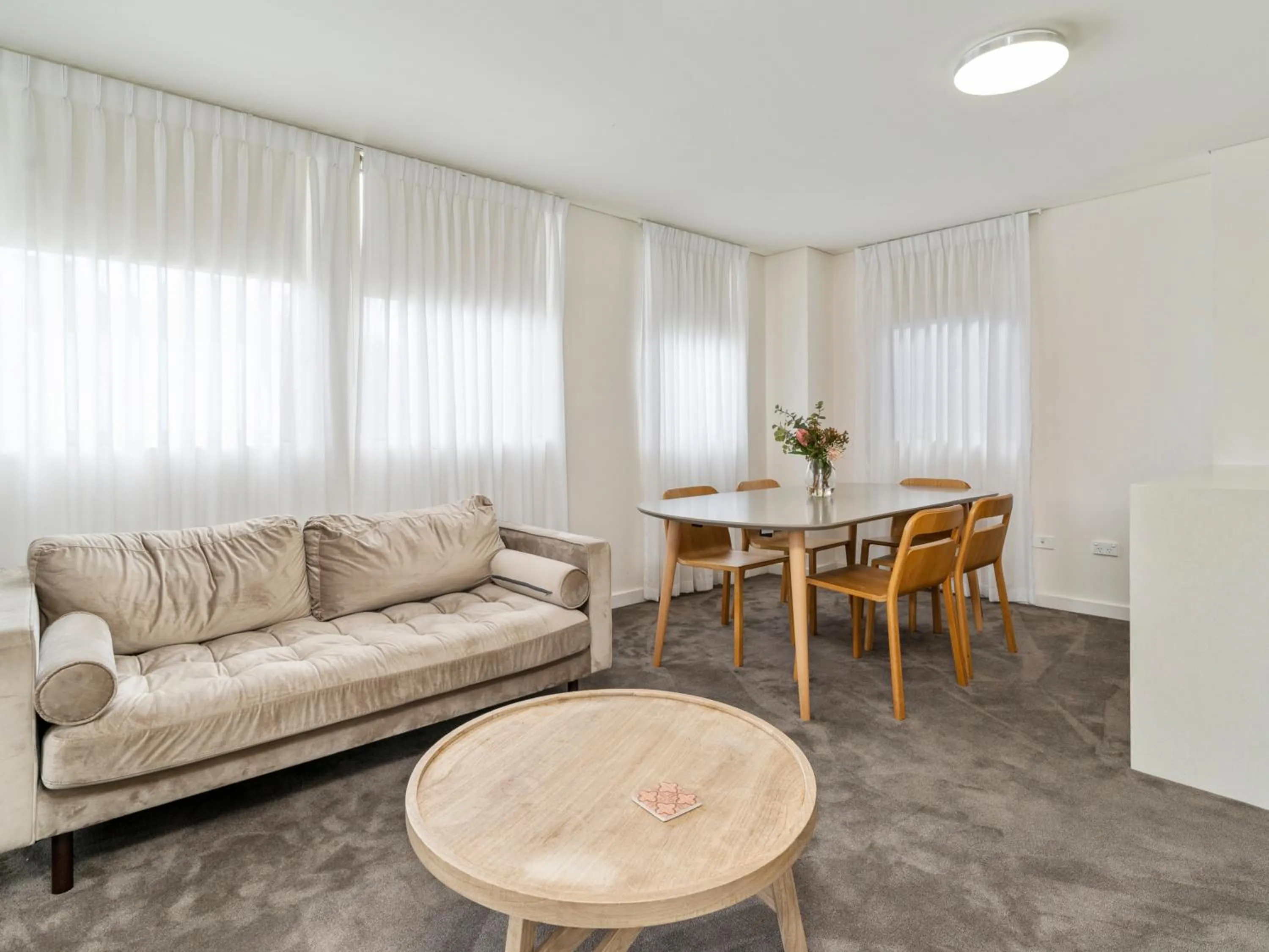 Communal lounge/ TV room in Terminus Apartment Hotel, an Ascend Collection Hotel