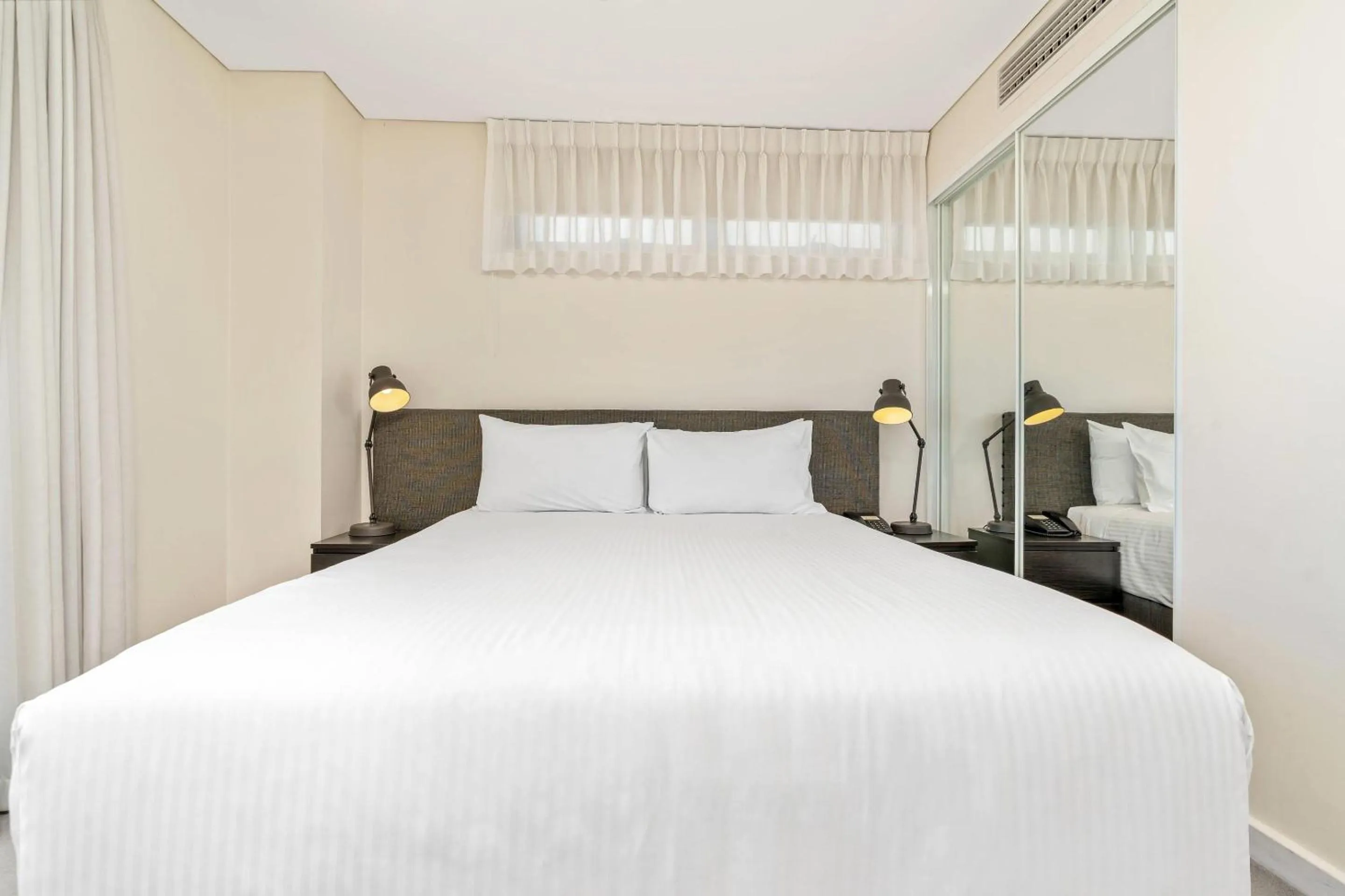 Bedroom, Bed in Terminus Apartment Hotel, an Ascend Collection Hotel