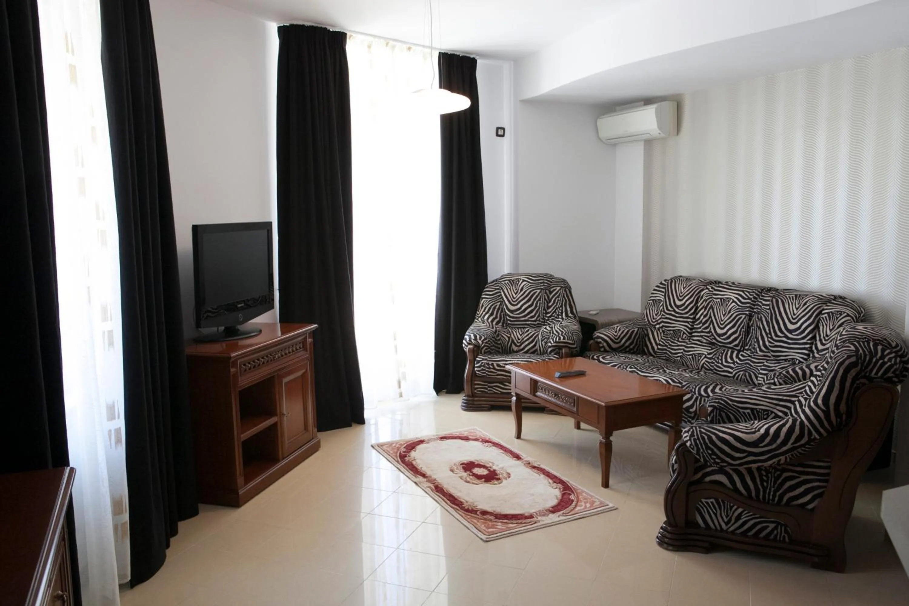 Living room in El Locanda Boutique Hotel