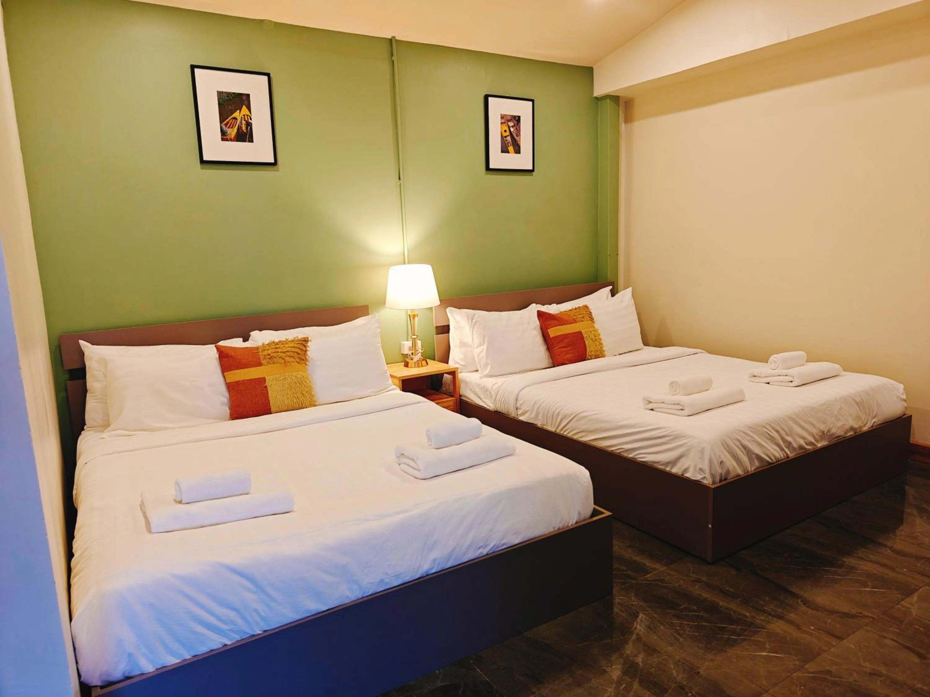 Bed in Ployburi Boutique Hotel