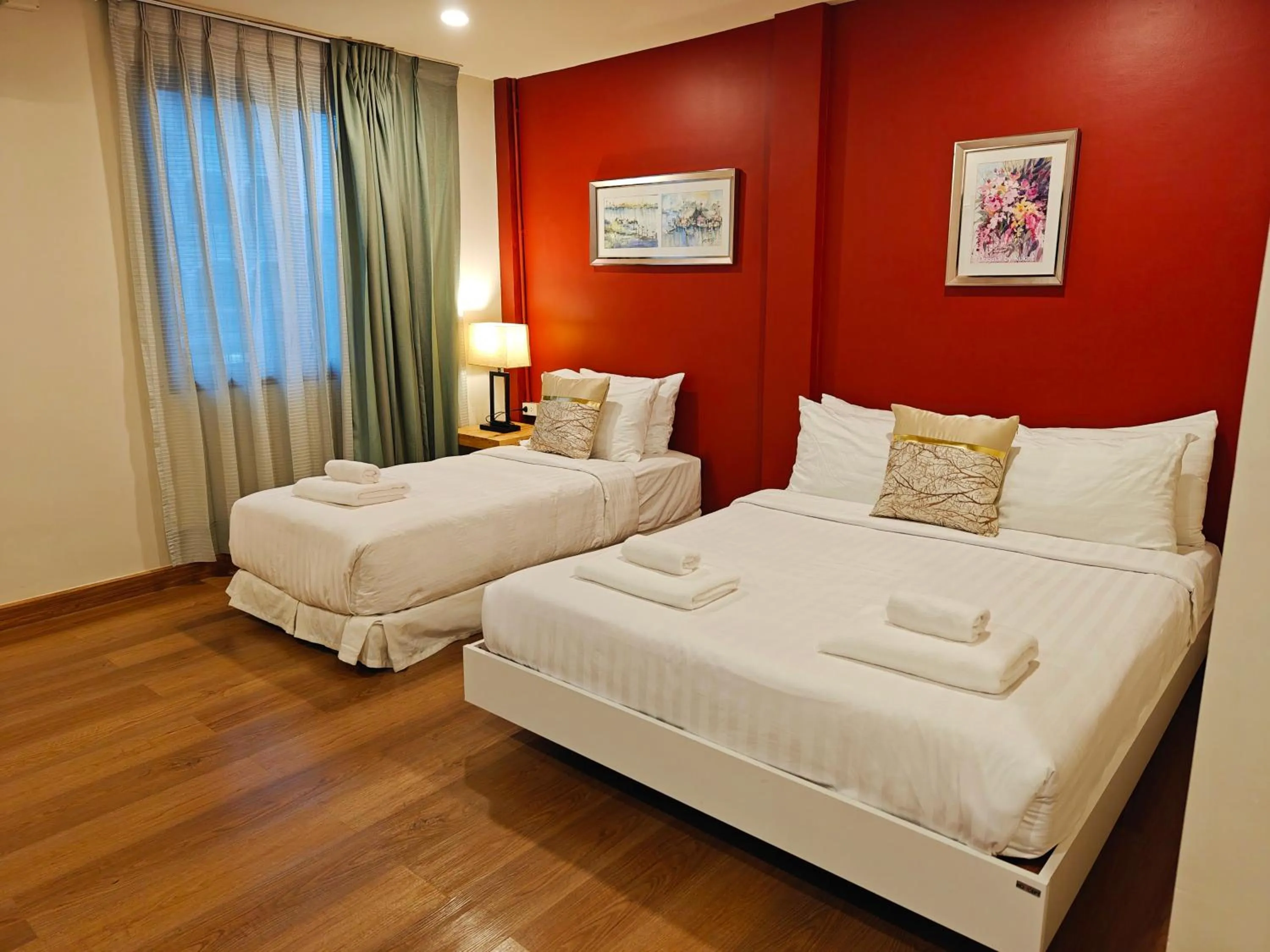 Bed in Ployburi Boutique Hotel